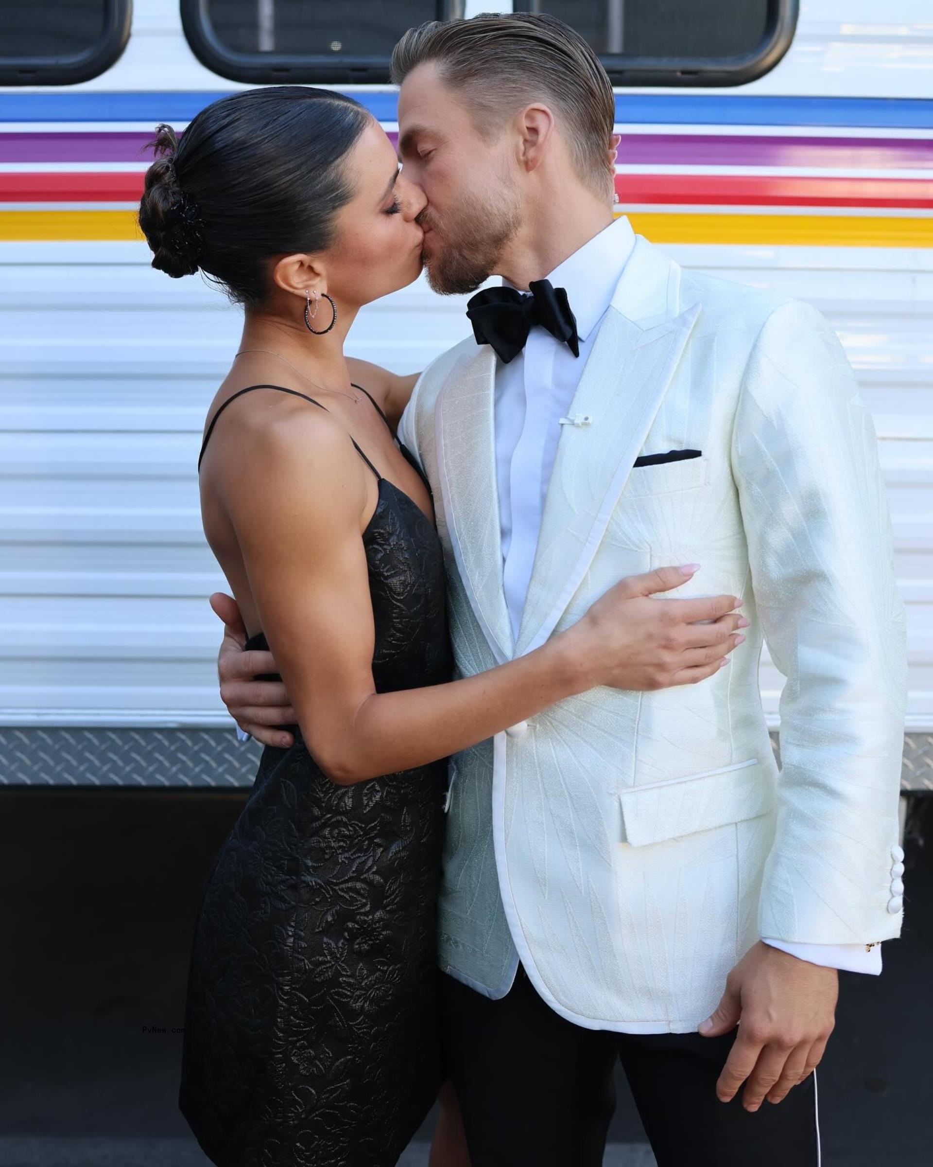 Hayley Erbert kissing Derek Hough