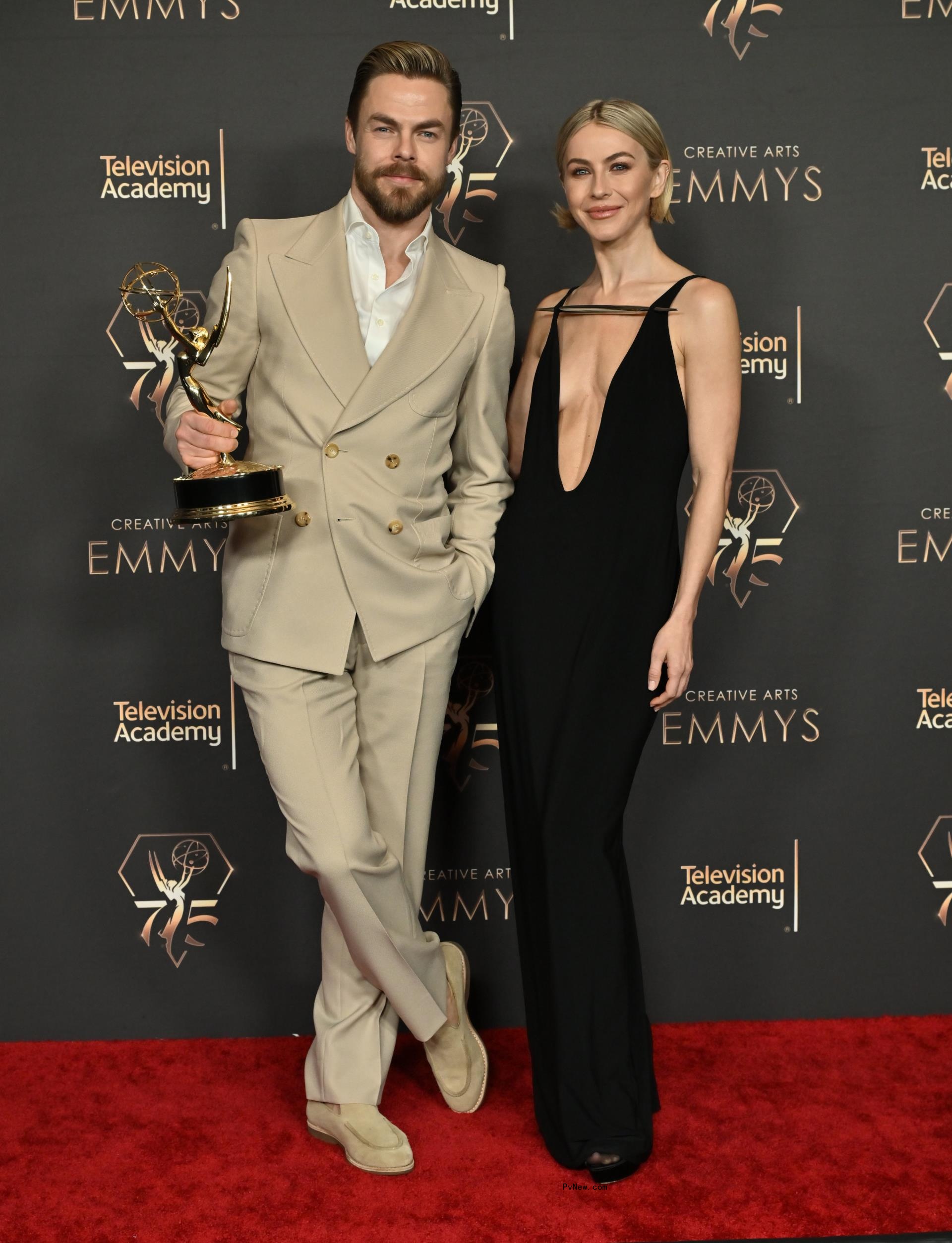 Derek Hough and Julianne Hough posing together 