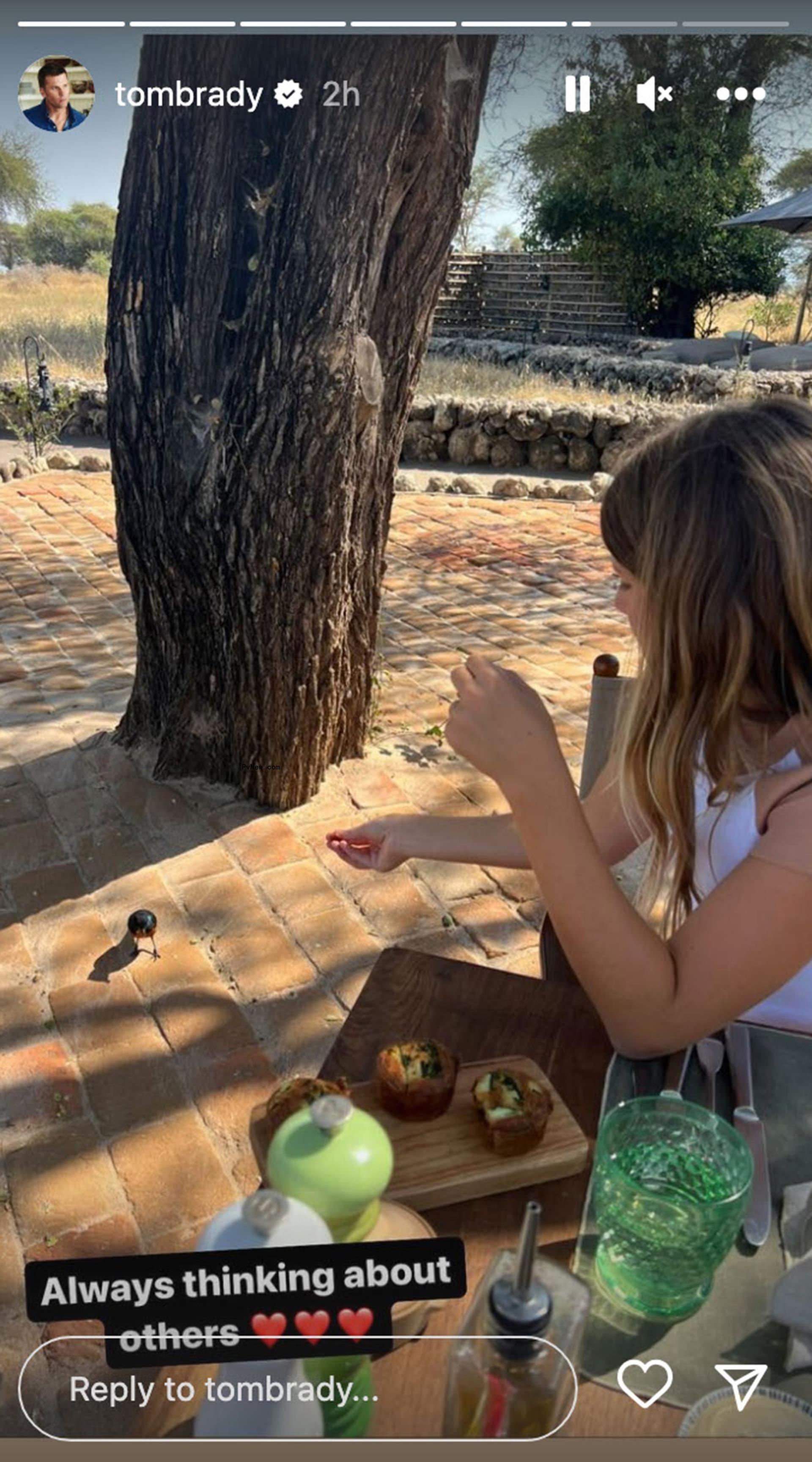 Vivian Brady feeding birds.