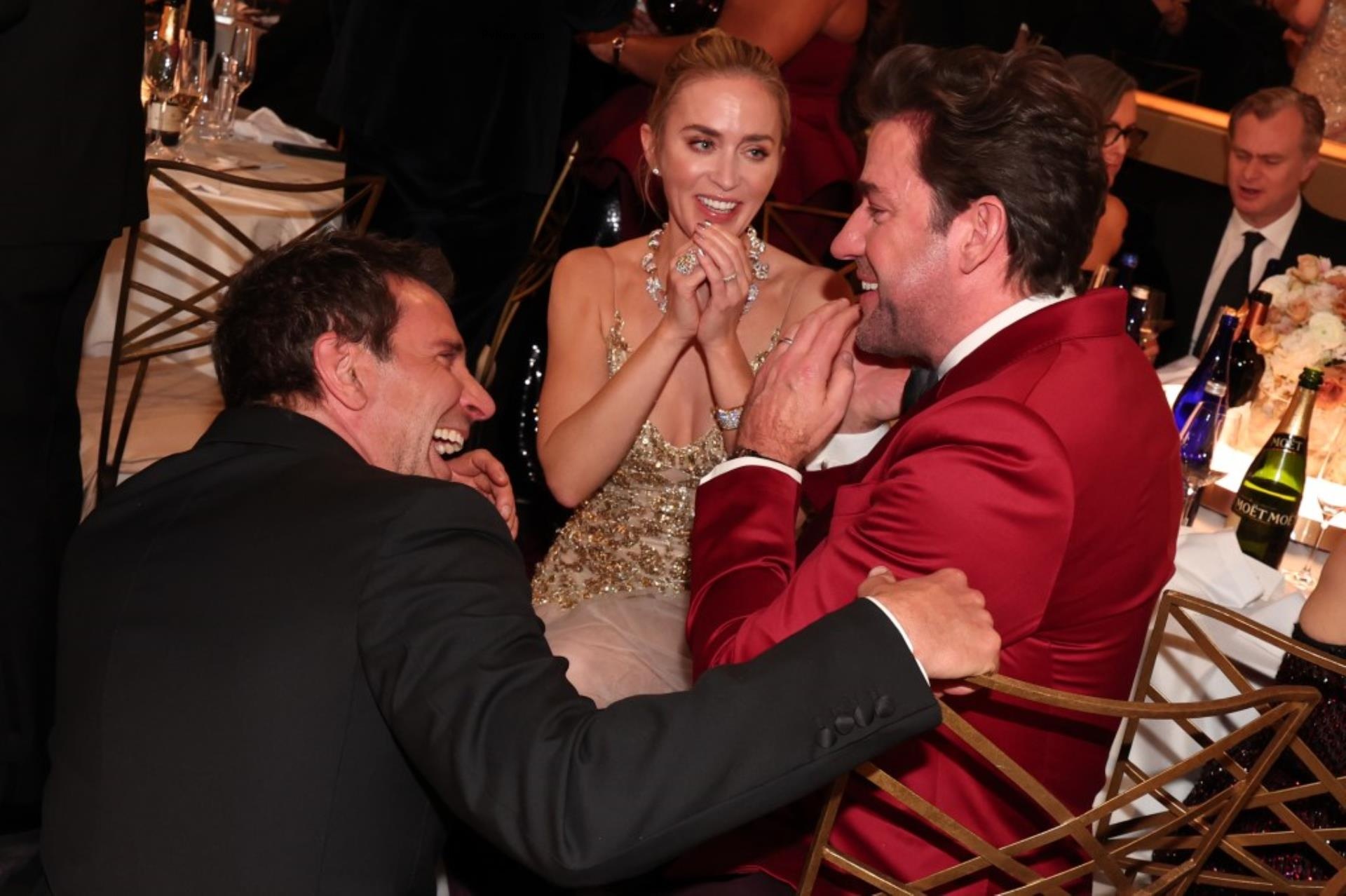 emily blunt, john krasinski and bradley cooper laughing inside the golden globes