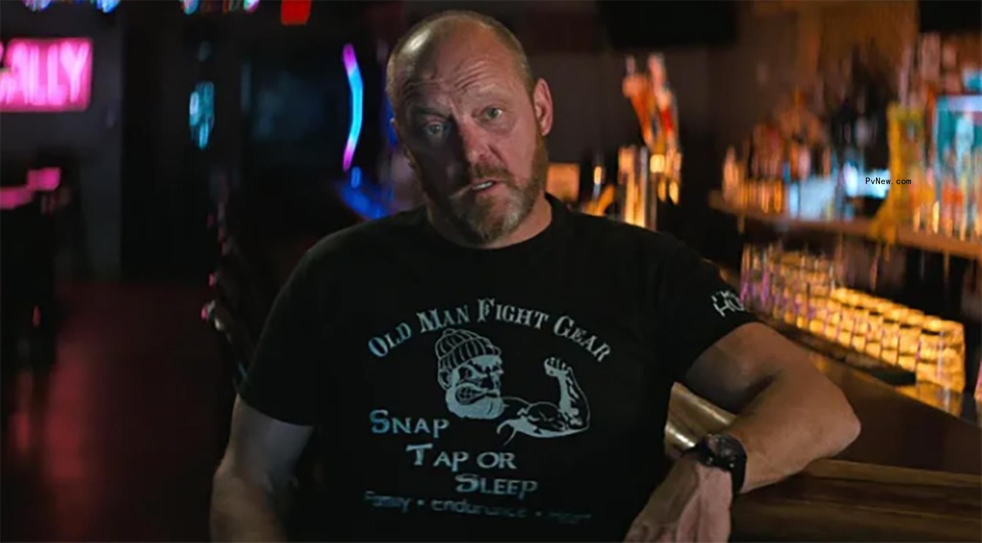 greg paul sitting at a bar