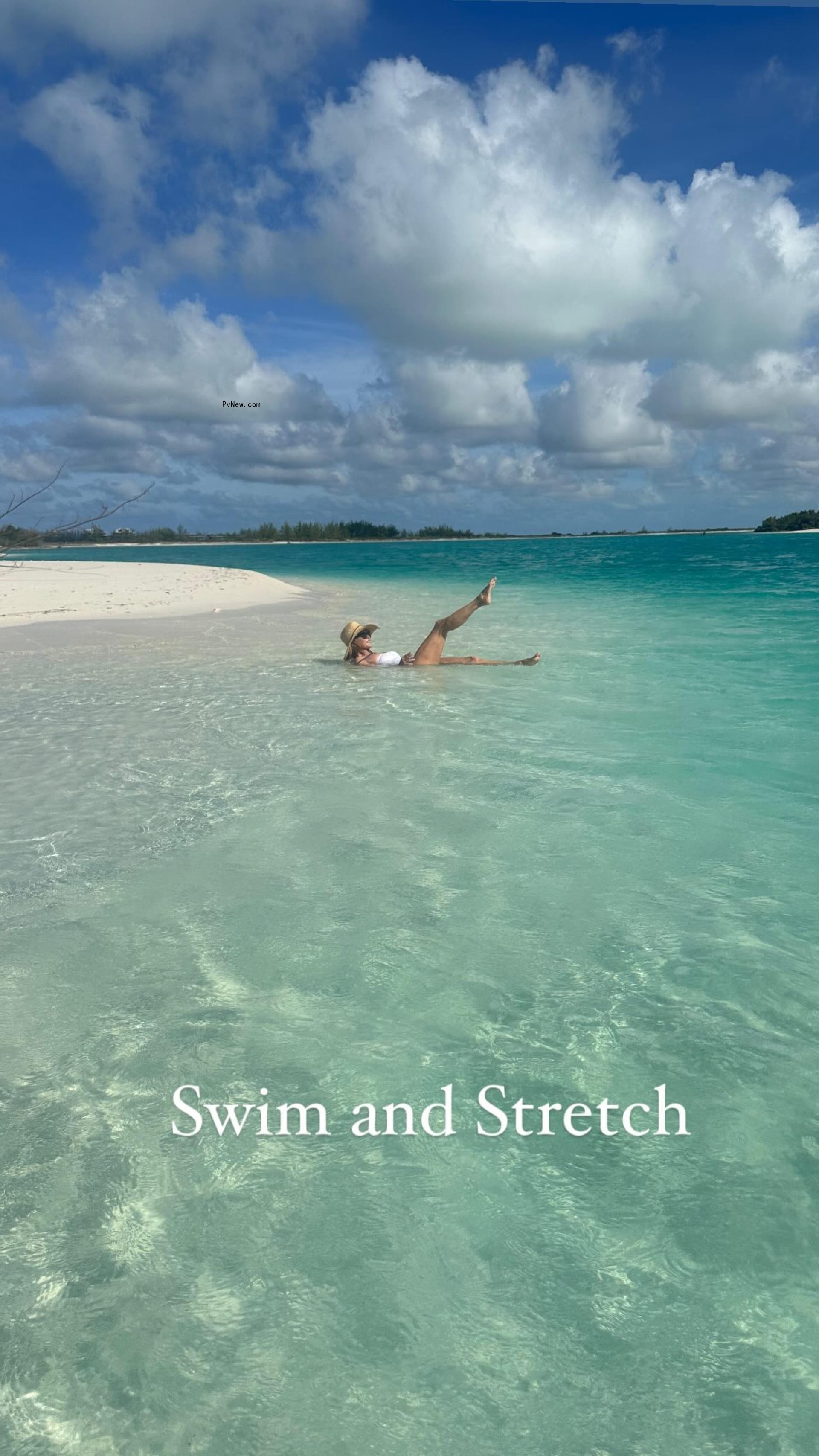 Christie Brinkley poses in a white swimsuit in Turks & Caicos.