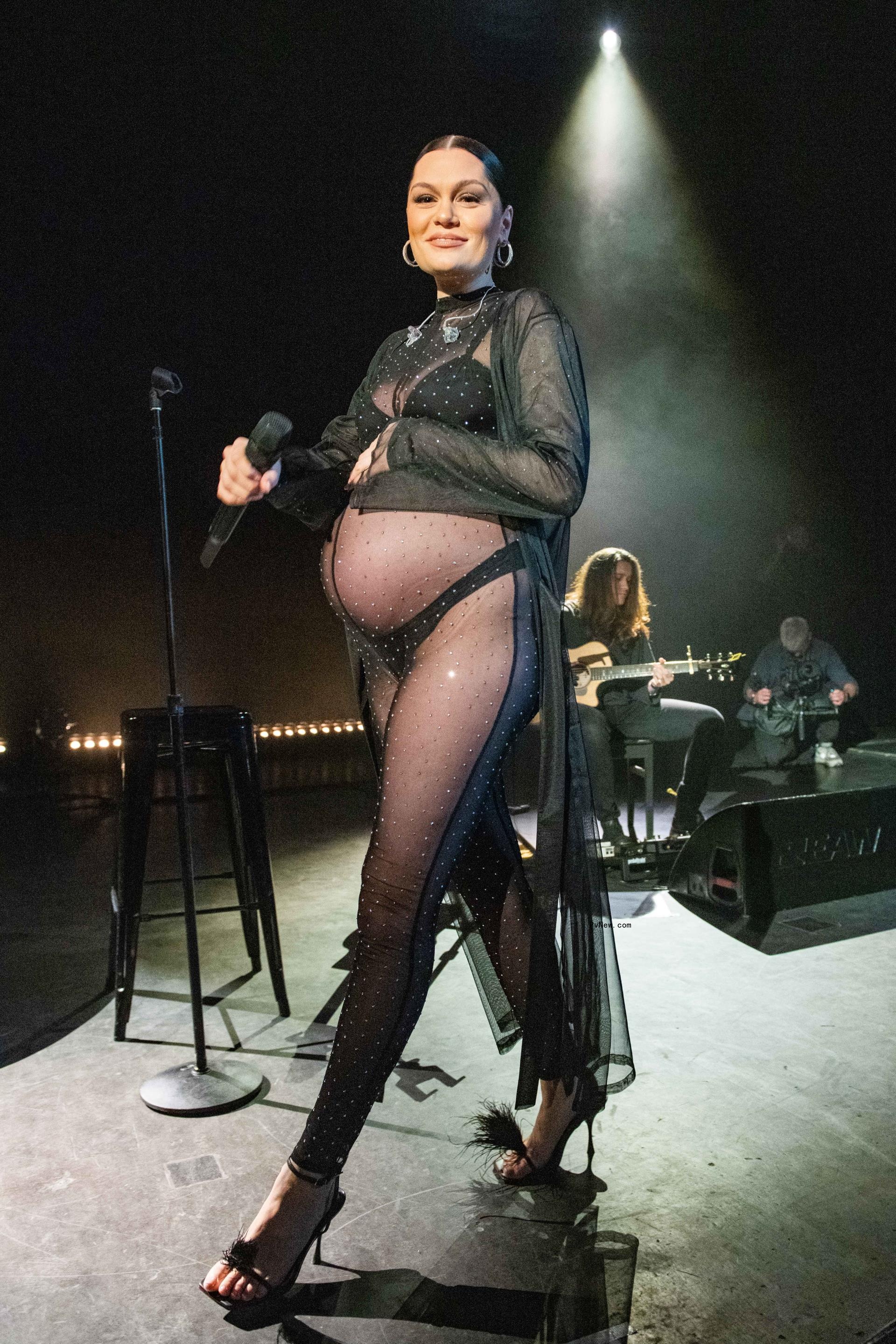 Jessie J pregnant and performing on stage.