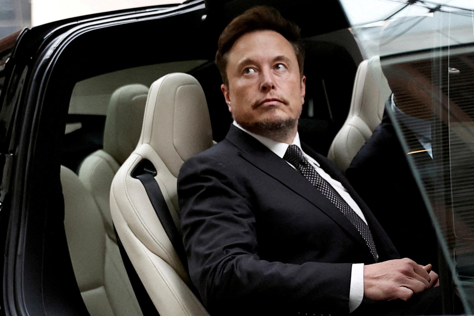 Elon Musk in a car.