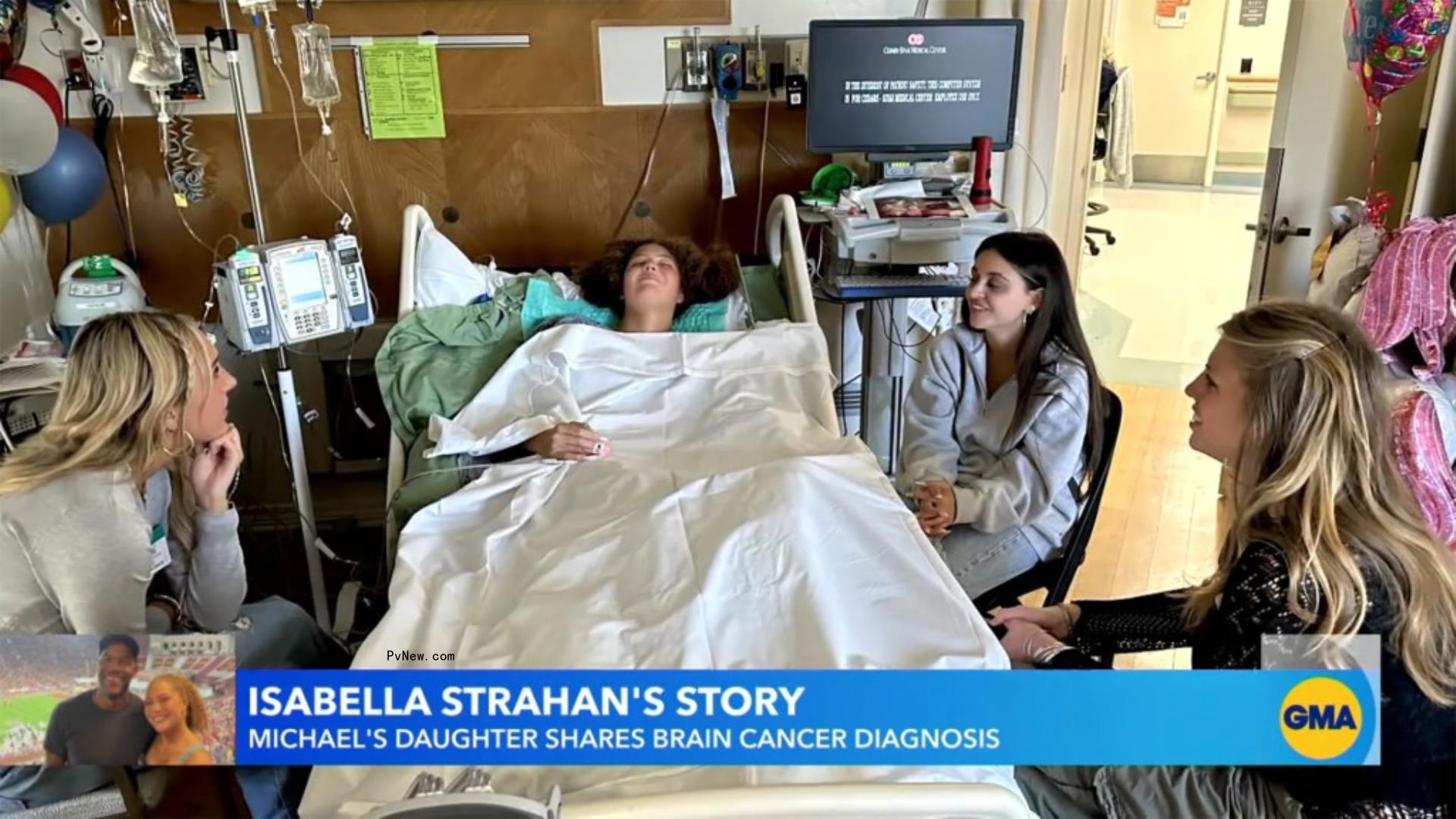 isabella strahan lying in hospital bed surrounded by friends