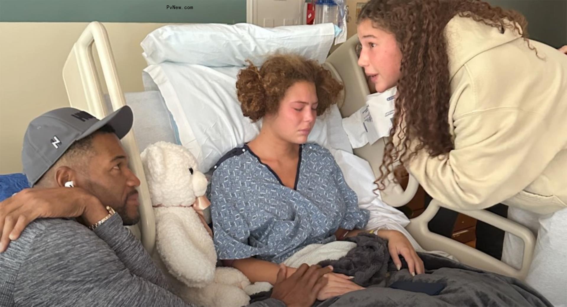 isabella strahan in bed surrounded by her twin, sophia, and dad michael strahan