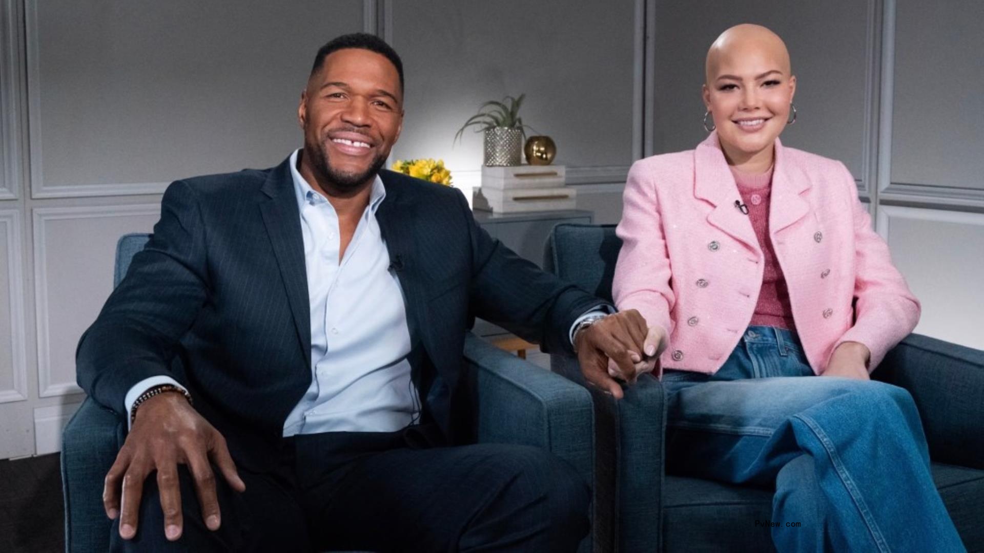 michael strahan holding his daughter isabella's hand