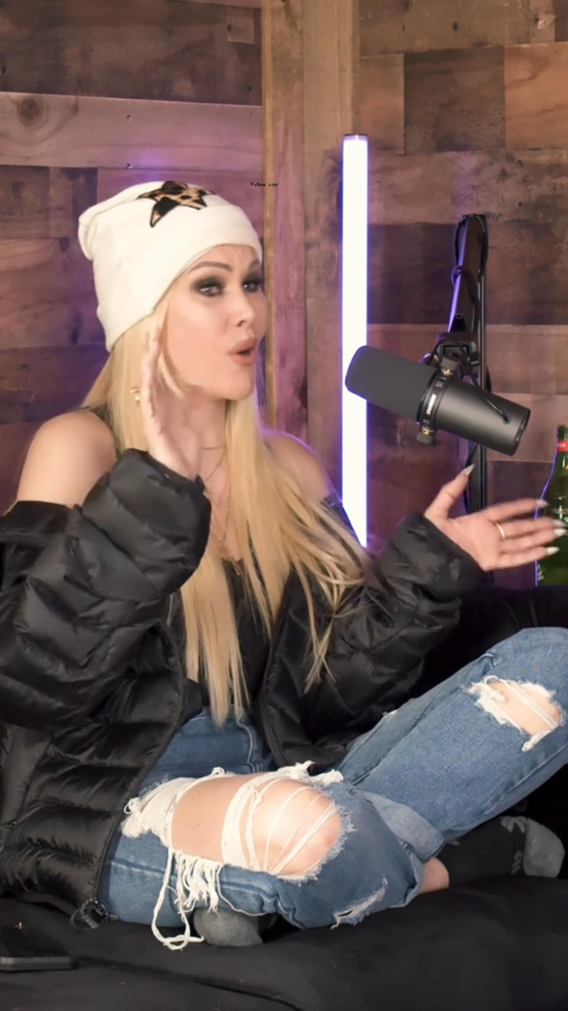 shanna moakler talking into a microphone