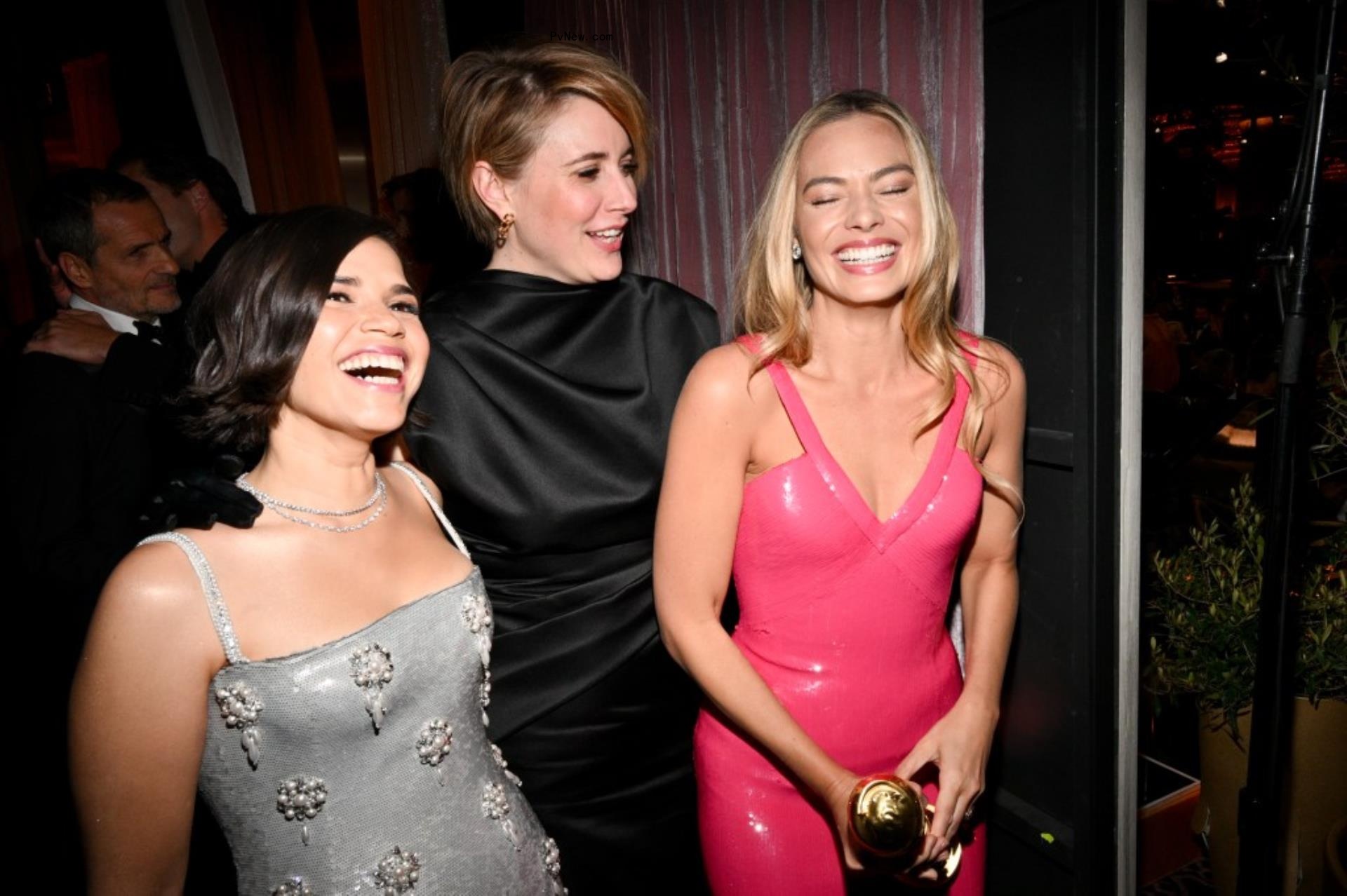 America Ferrera, Greta Gerwig and Margot Robbie laughing at the 81st Golden Globe Awards