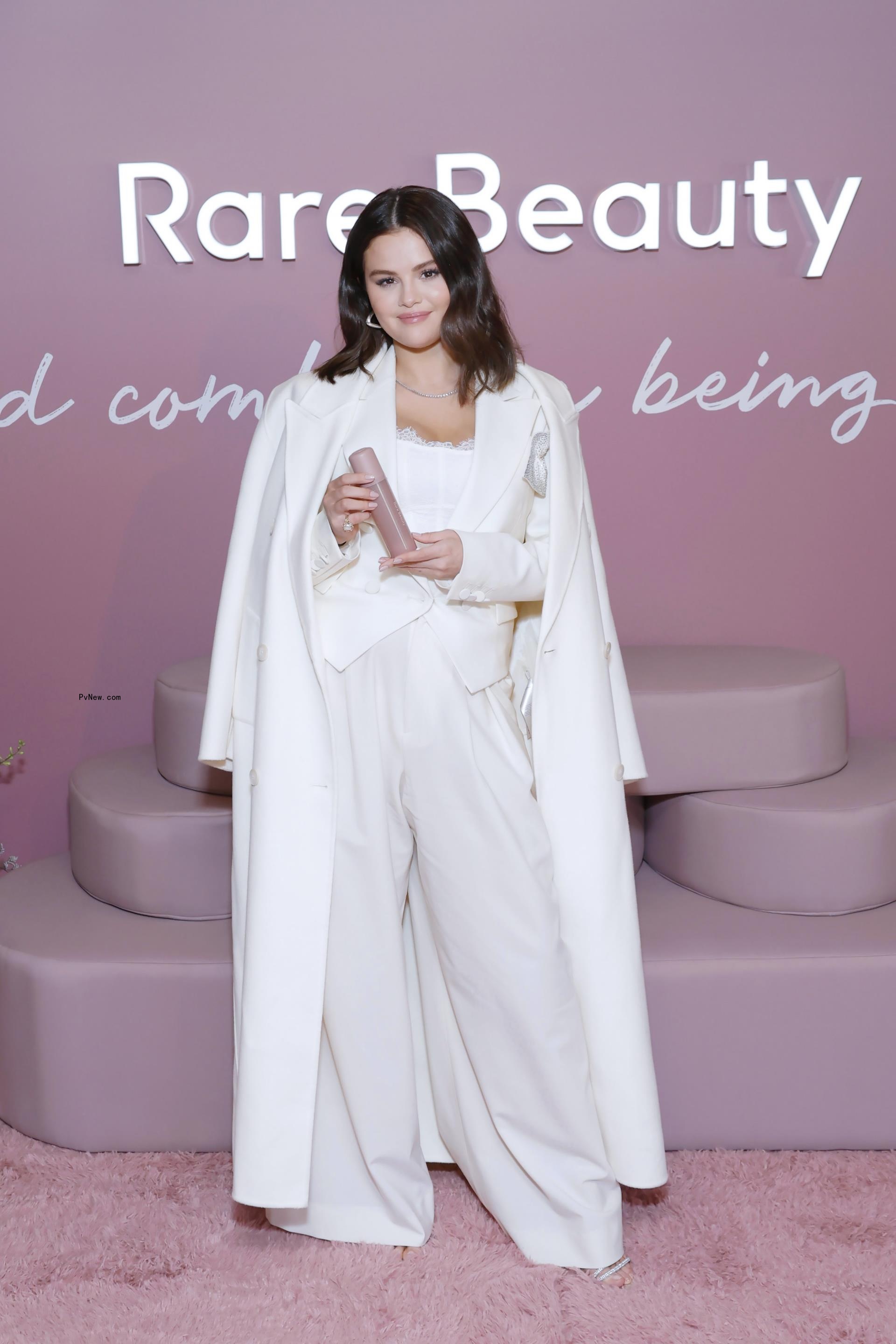 Selena Gomez wears $70 white corset top to a Rare Beauty event in Los Angeles.