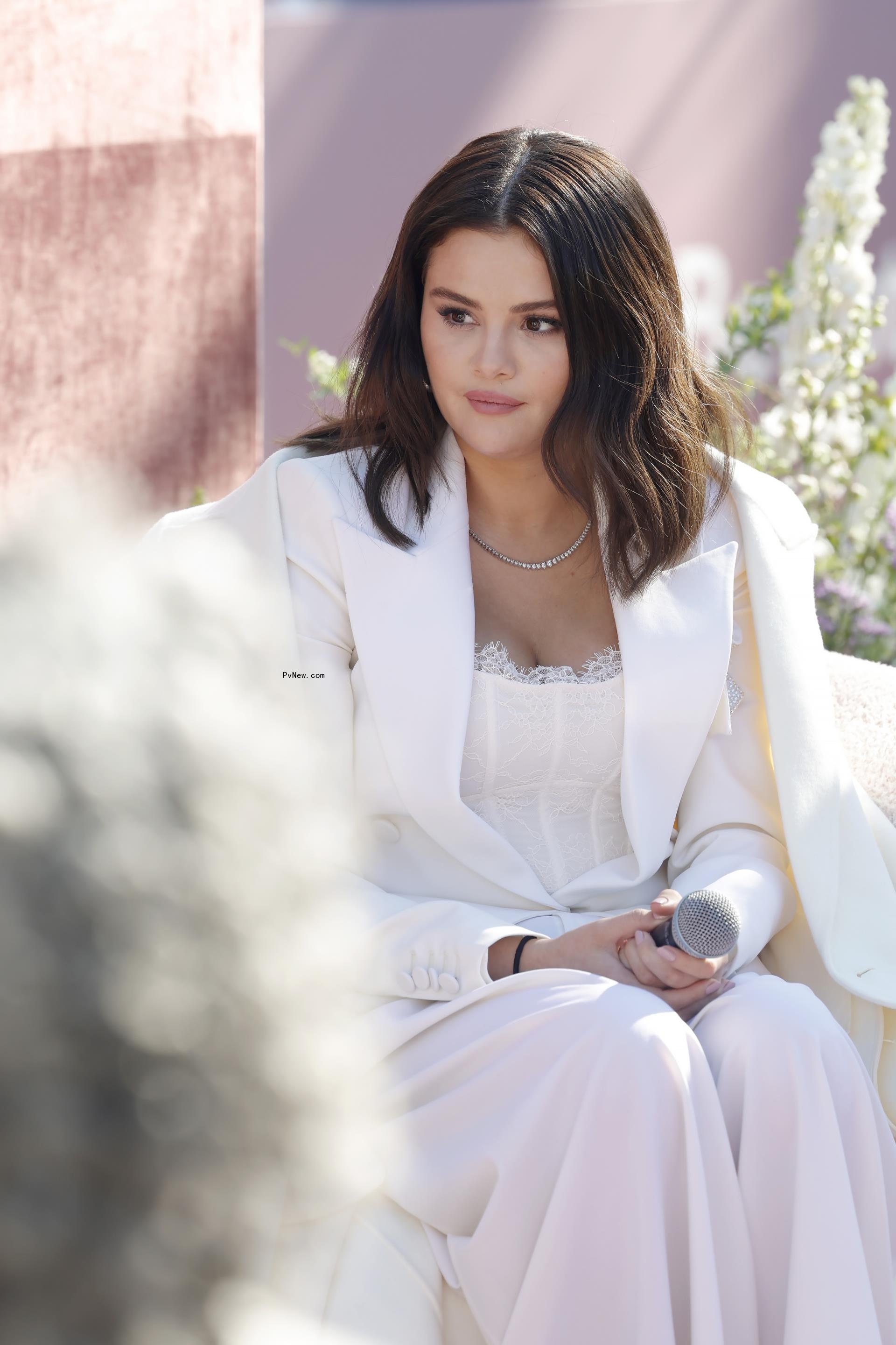 Selena Gomez wears $70 white corset top to a Rare Beauty event in Los Angeles.