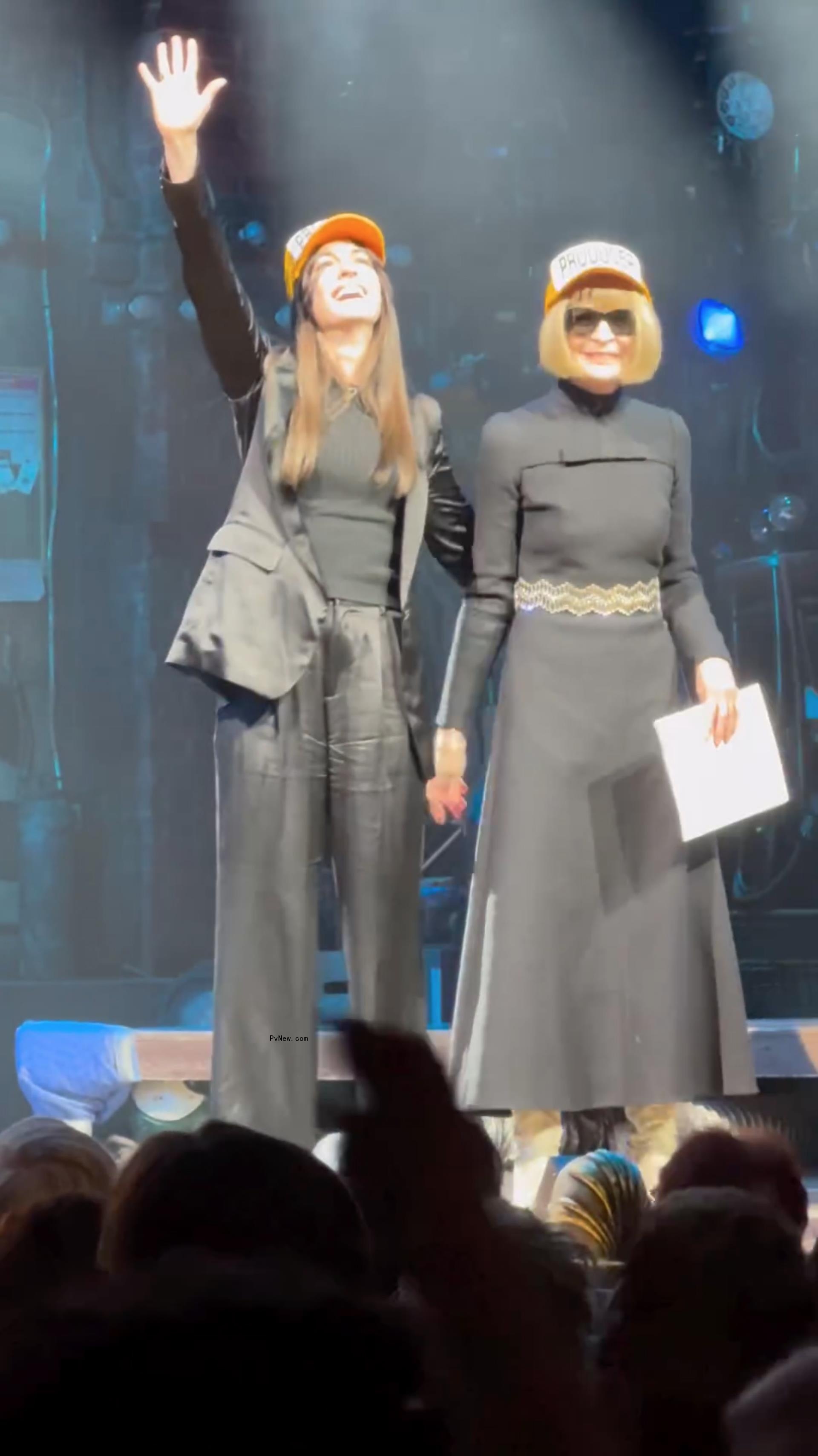 Anna Wintour and Anne Hathaway on stage at 