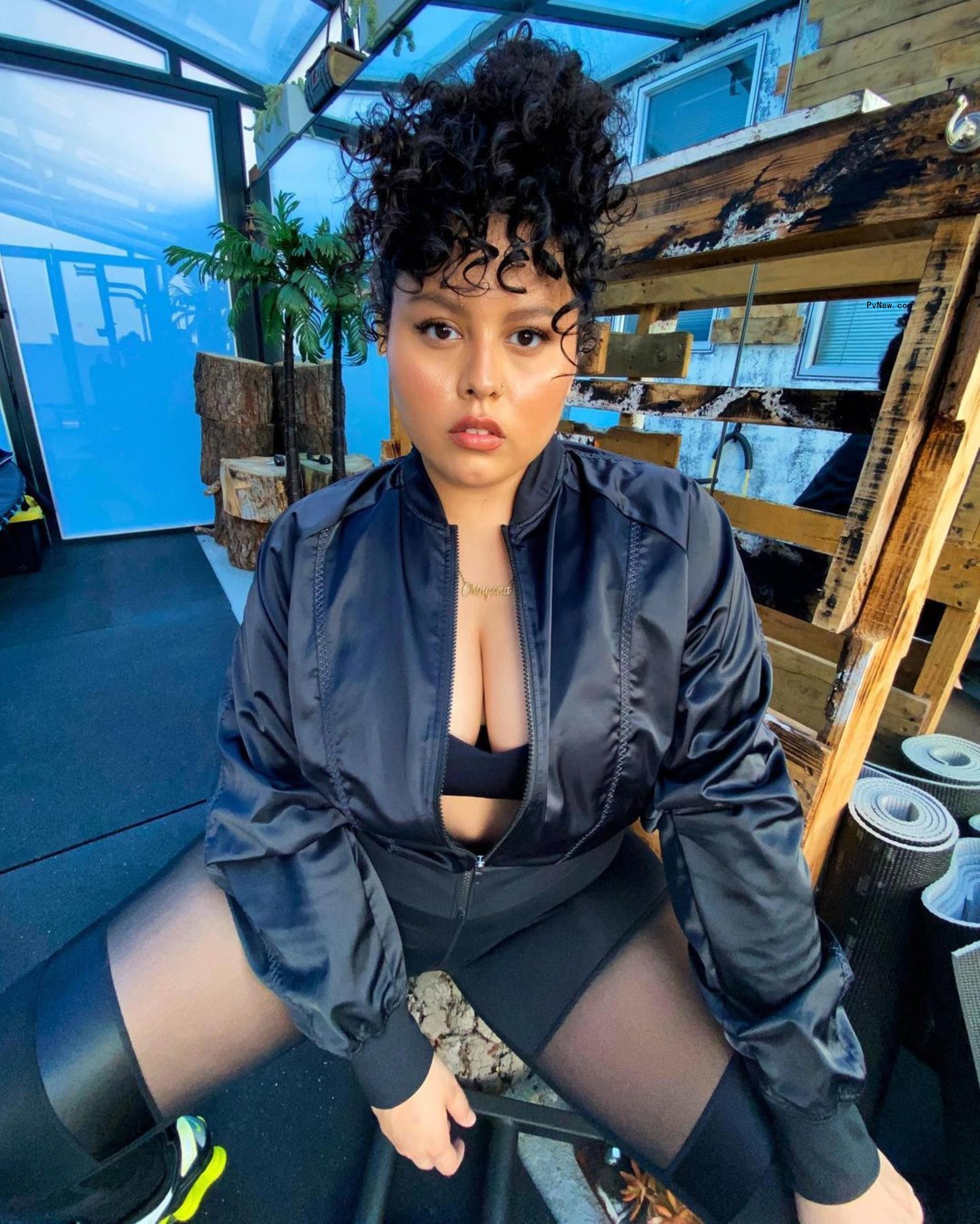 Noelle Rodriguez in a black outfit.