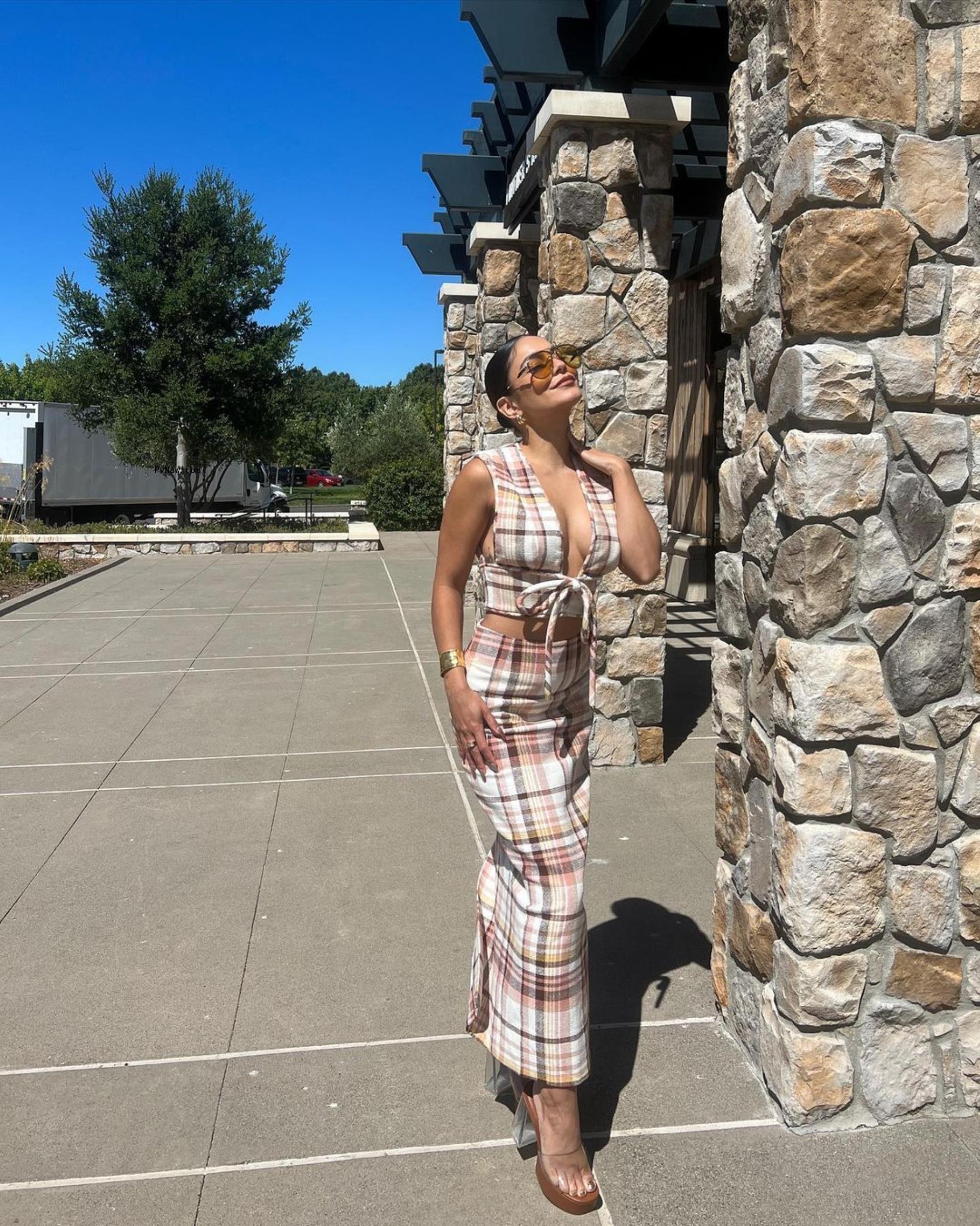 Vanessa Hudgens wearing a checked outfit