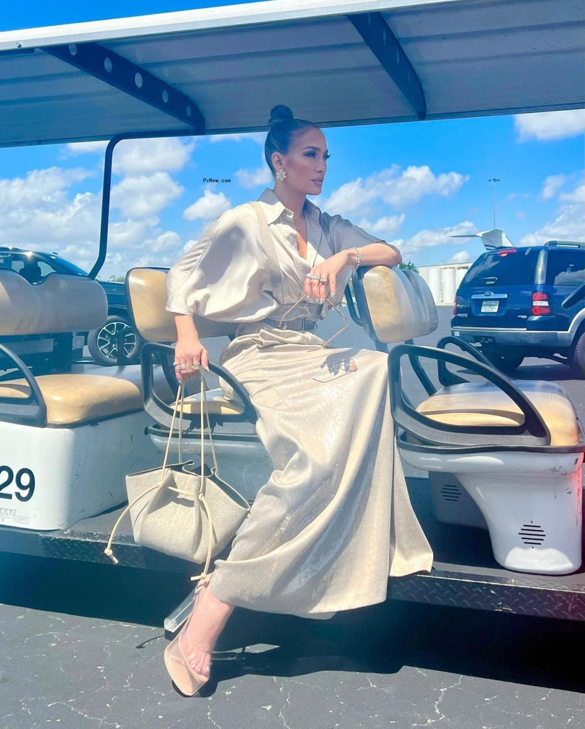 Jennifer Lopez on a golf cart