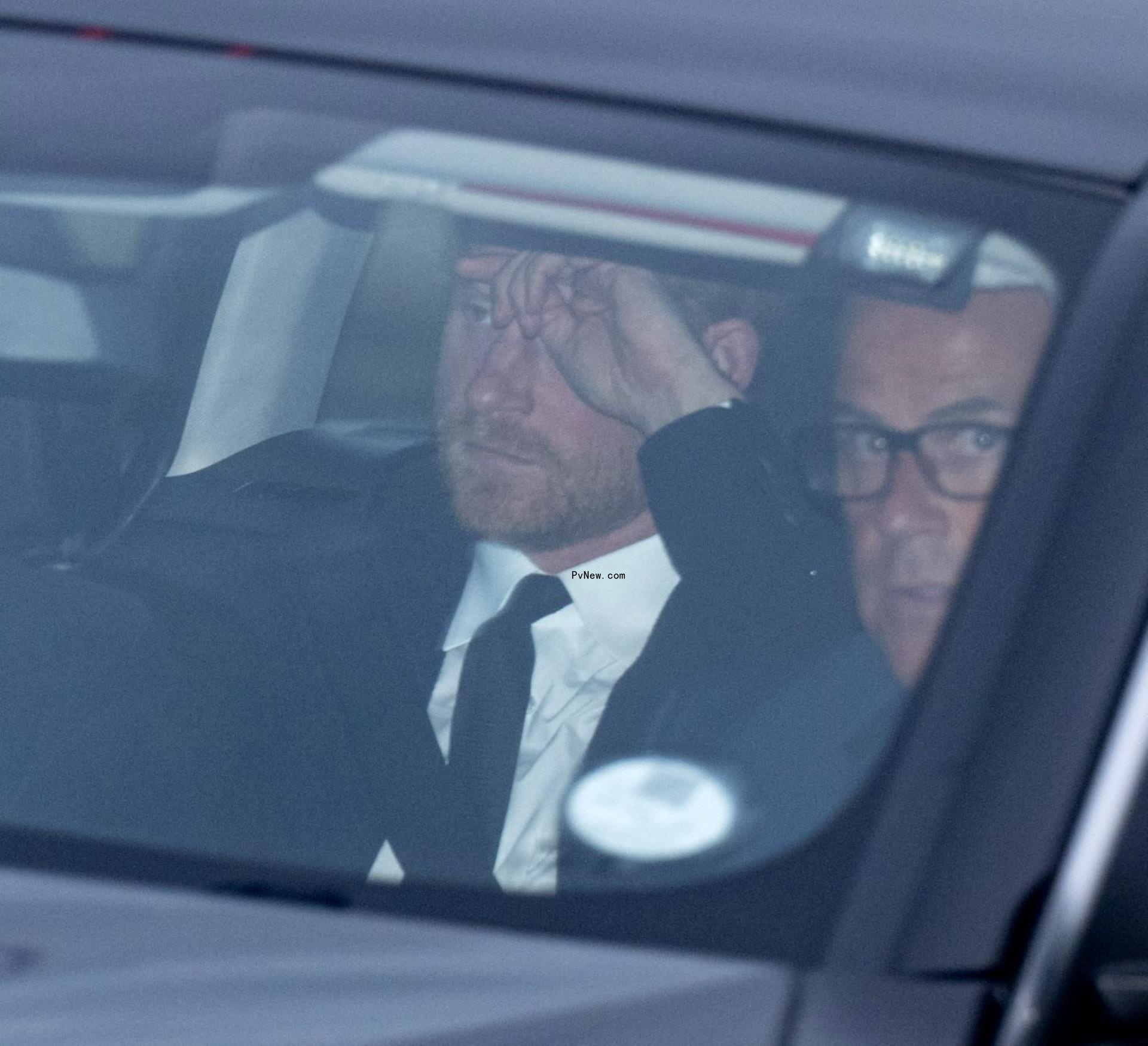 Prince Harry in a car.