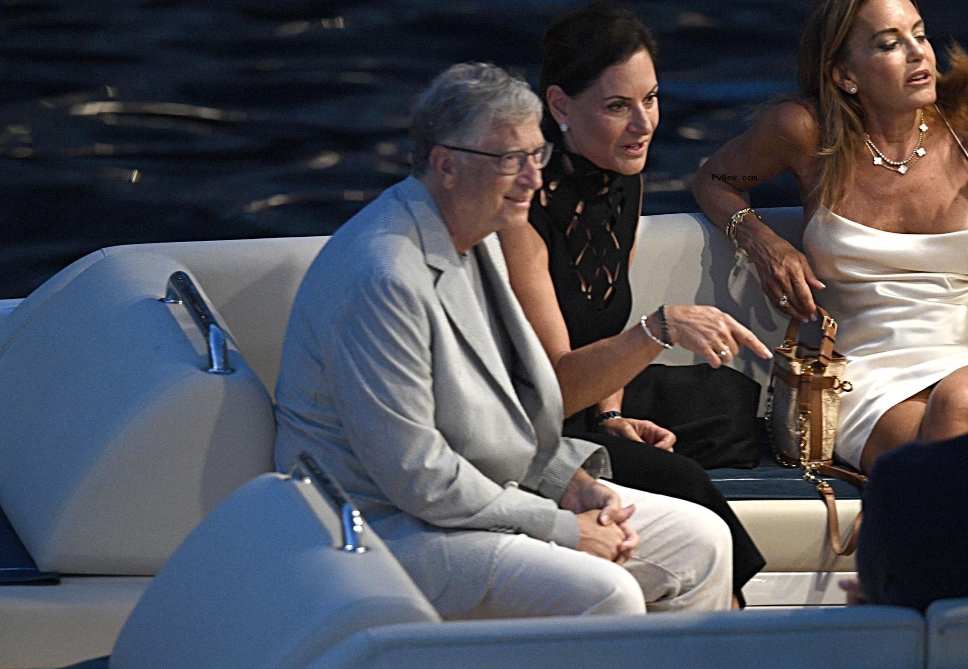 Bill Gates, Paula Hurd and another guest aboard Jeff Bezos' yacht.