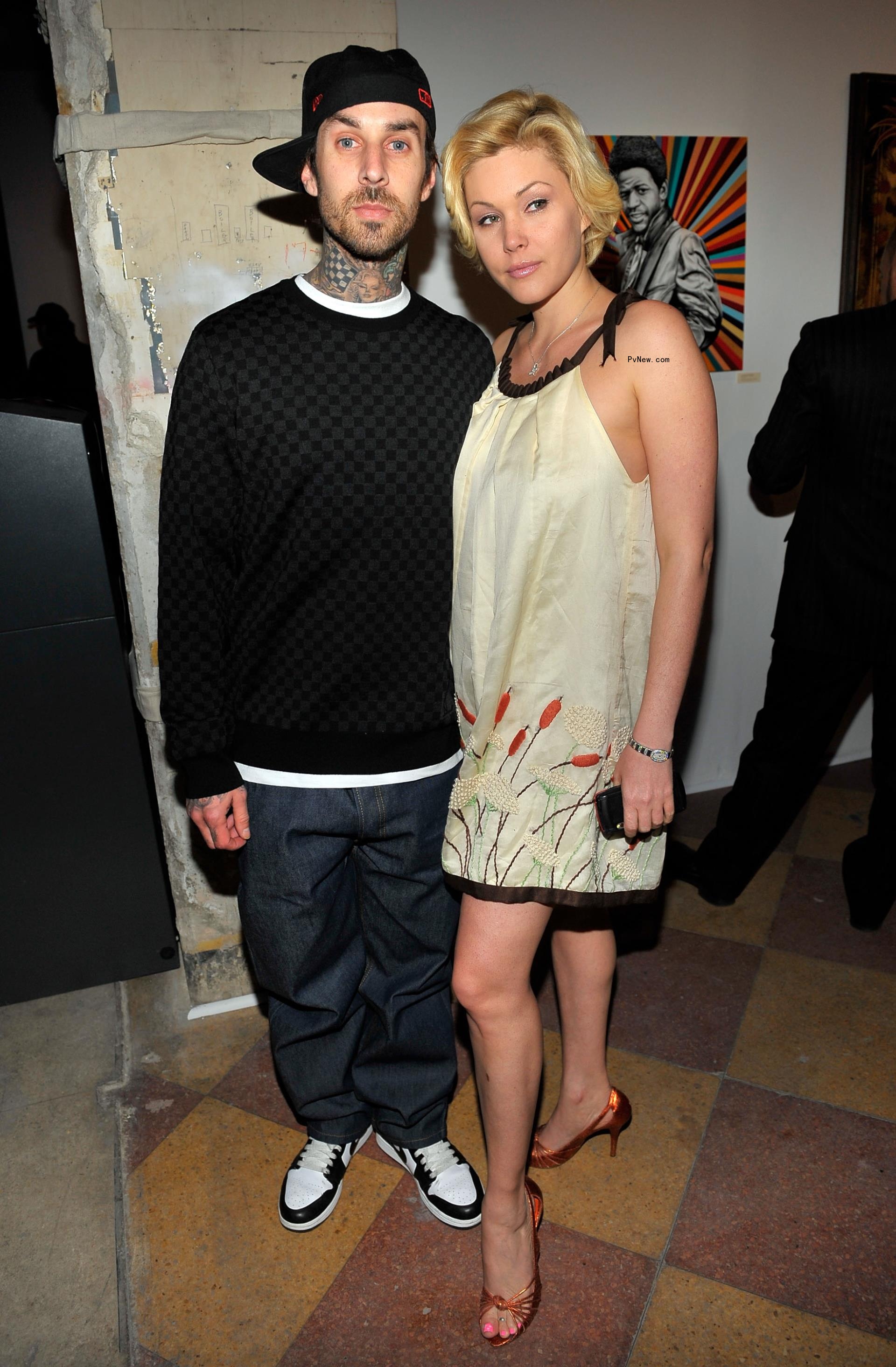 Travis Barker and Shanna Moakler at the launch of Worlds on Fire: Grammy-Nominated Artist Exhibition in 2009.