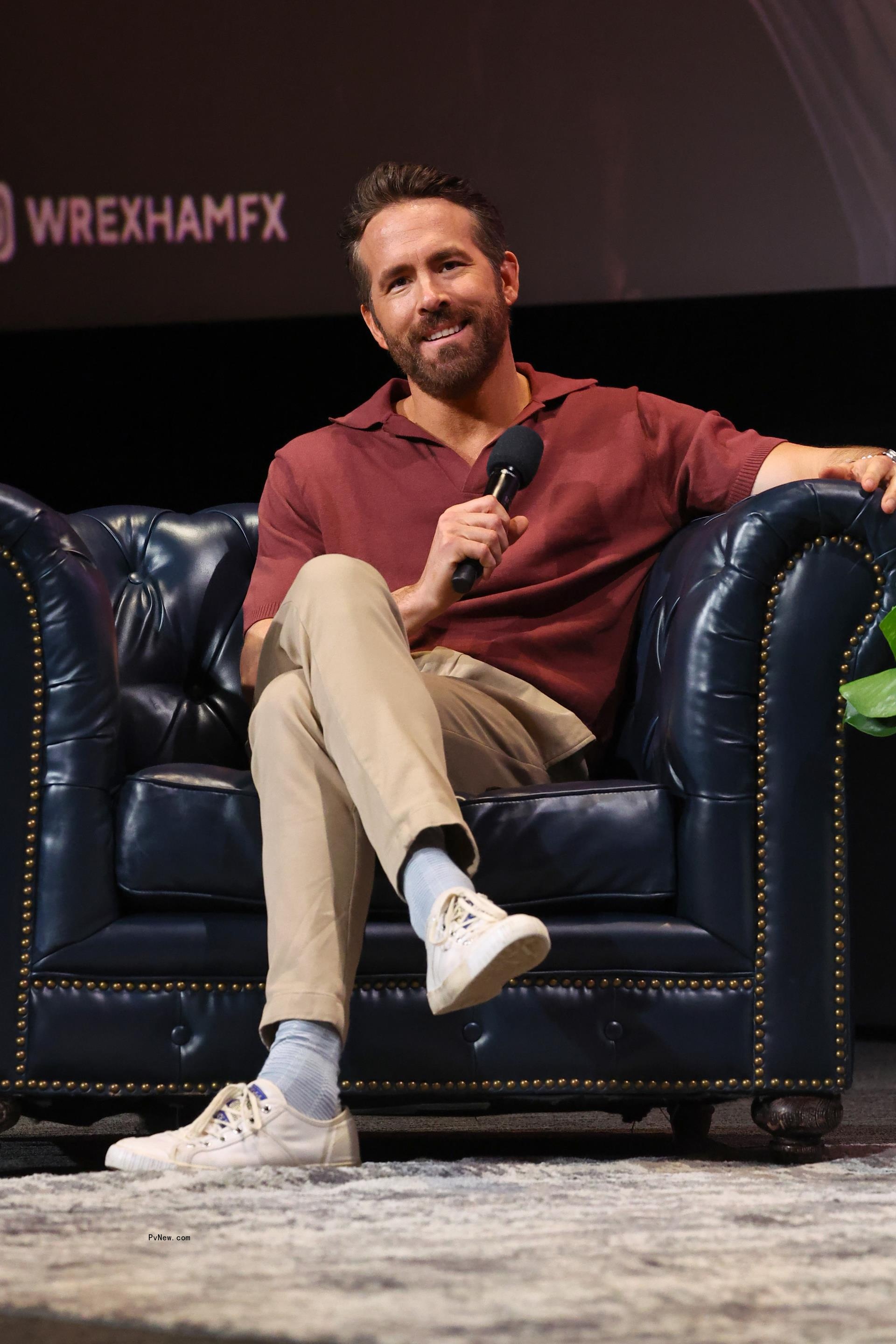 Ryan Reynolds sitting