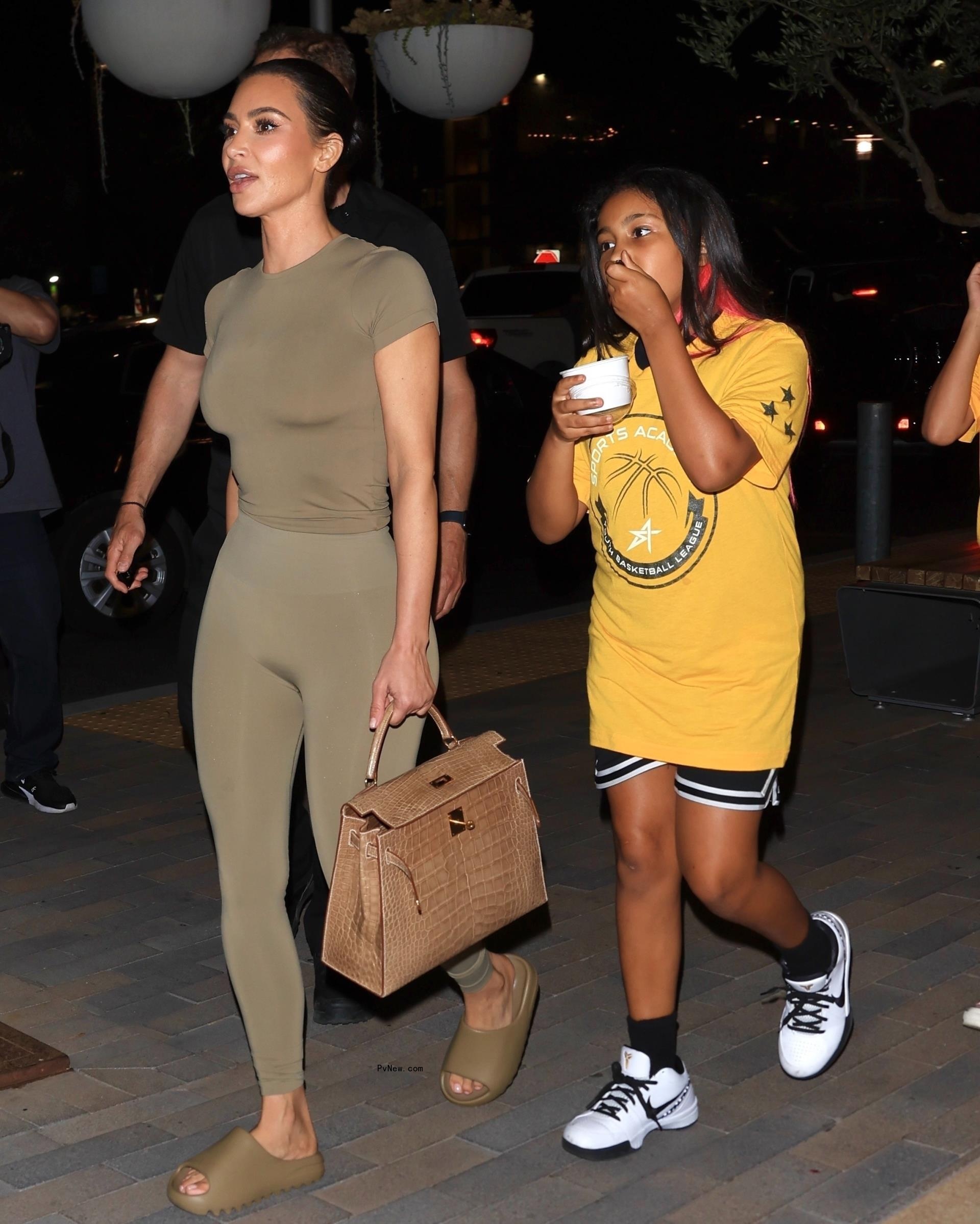 Kim Kardashian and North West going to dinner.
