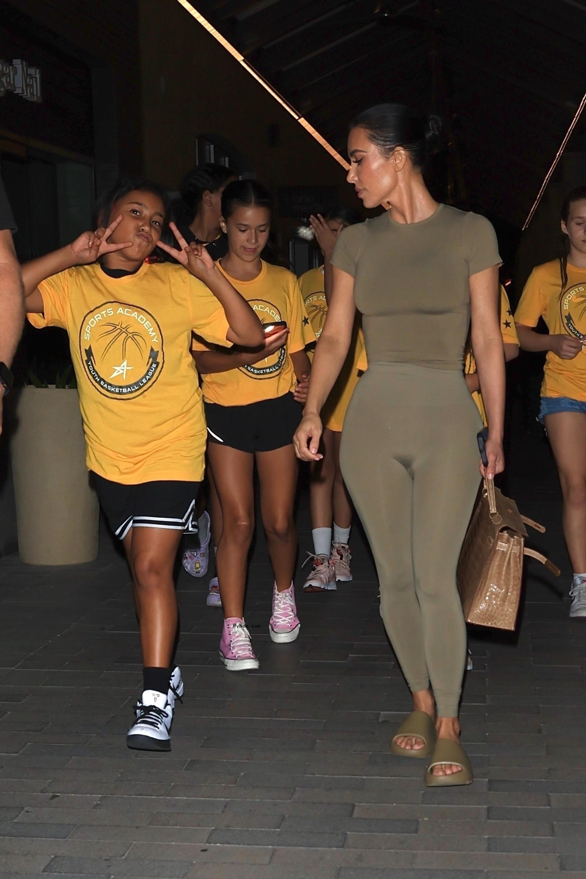 North West and Kim Kardashian going to dinner.