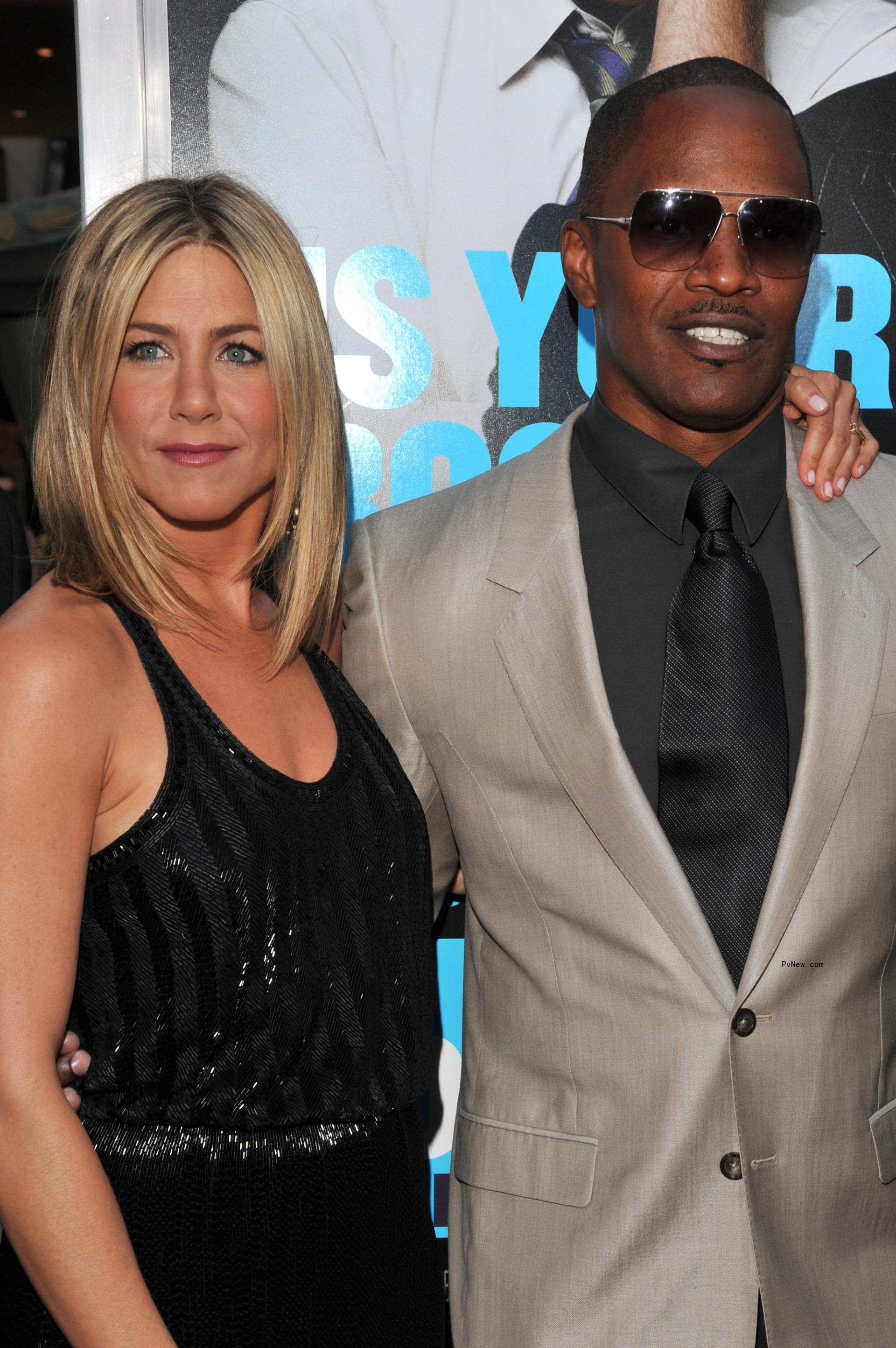 Jamie Foxx in a purple suit.