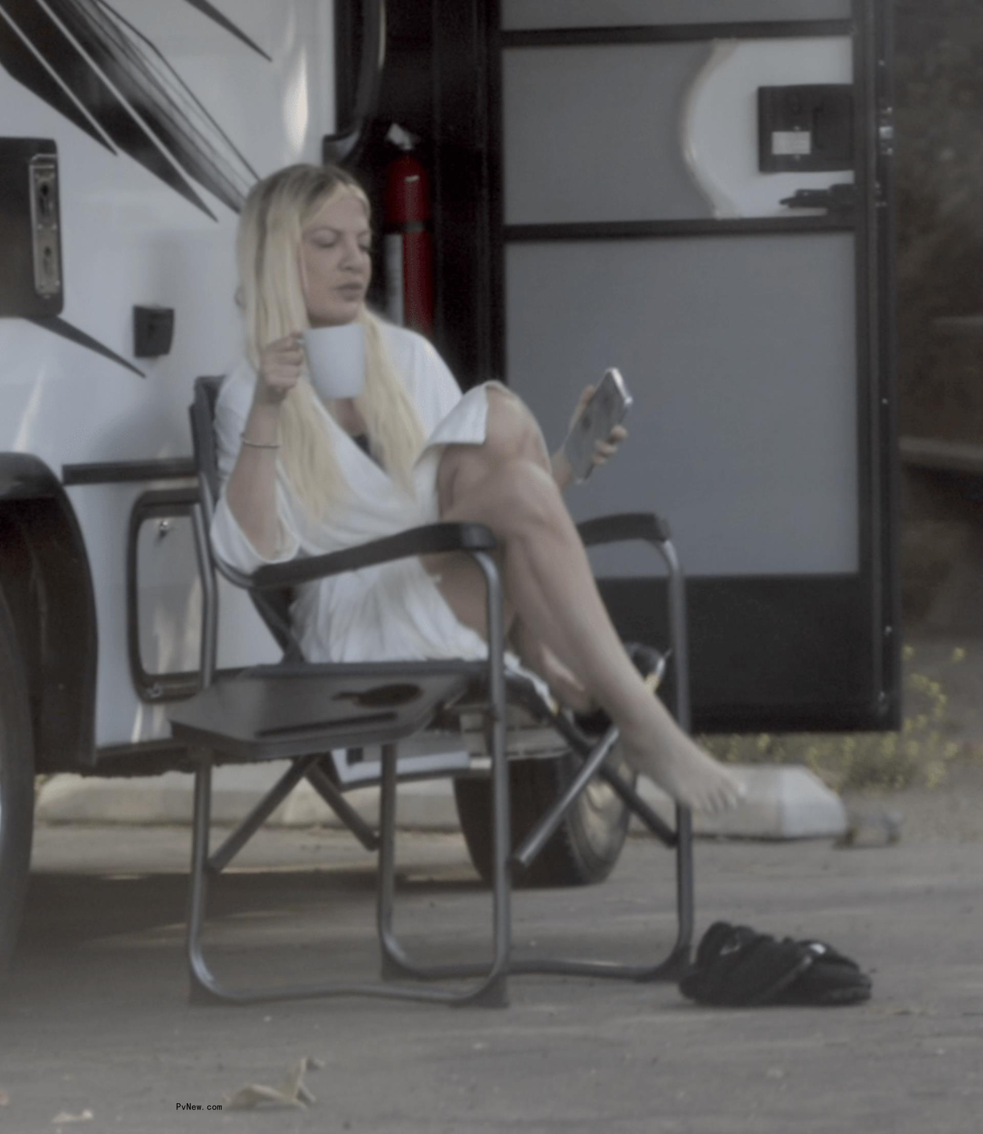 Tori Spelling outside of her RV.