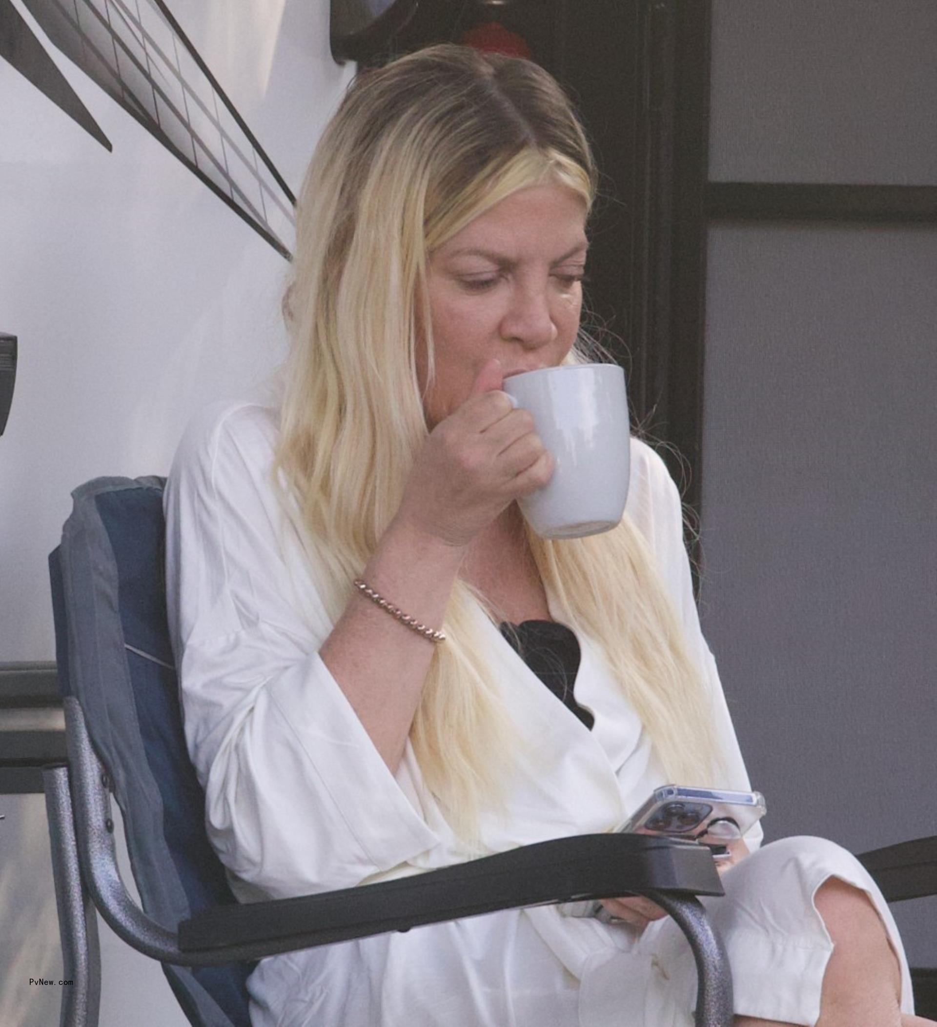 Tori Spelling on the camp grounds. 