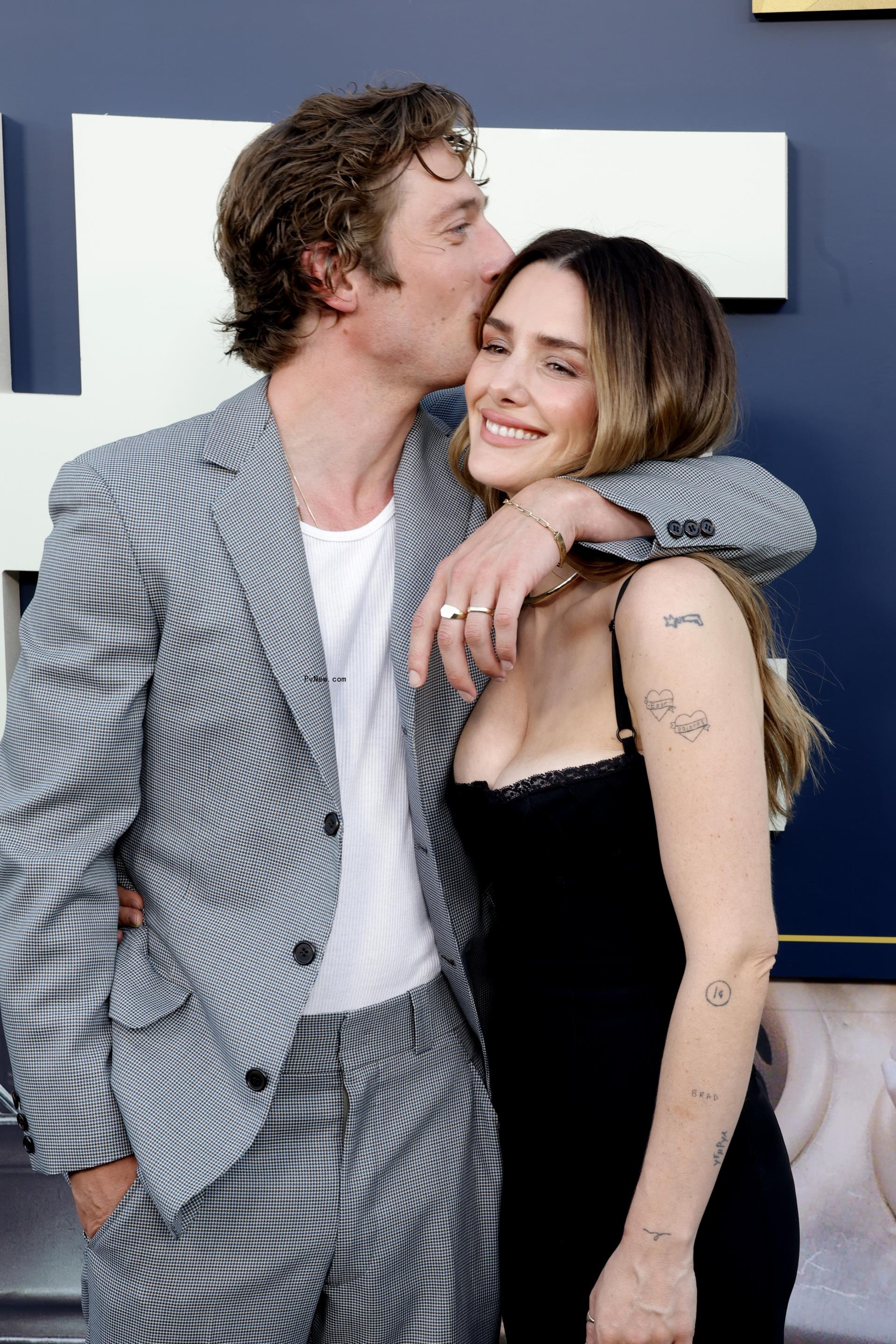 Jeremy Allen White kissing Addison Timlin at 