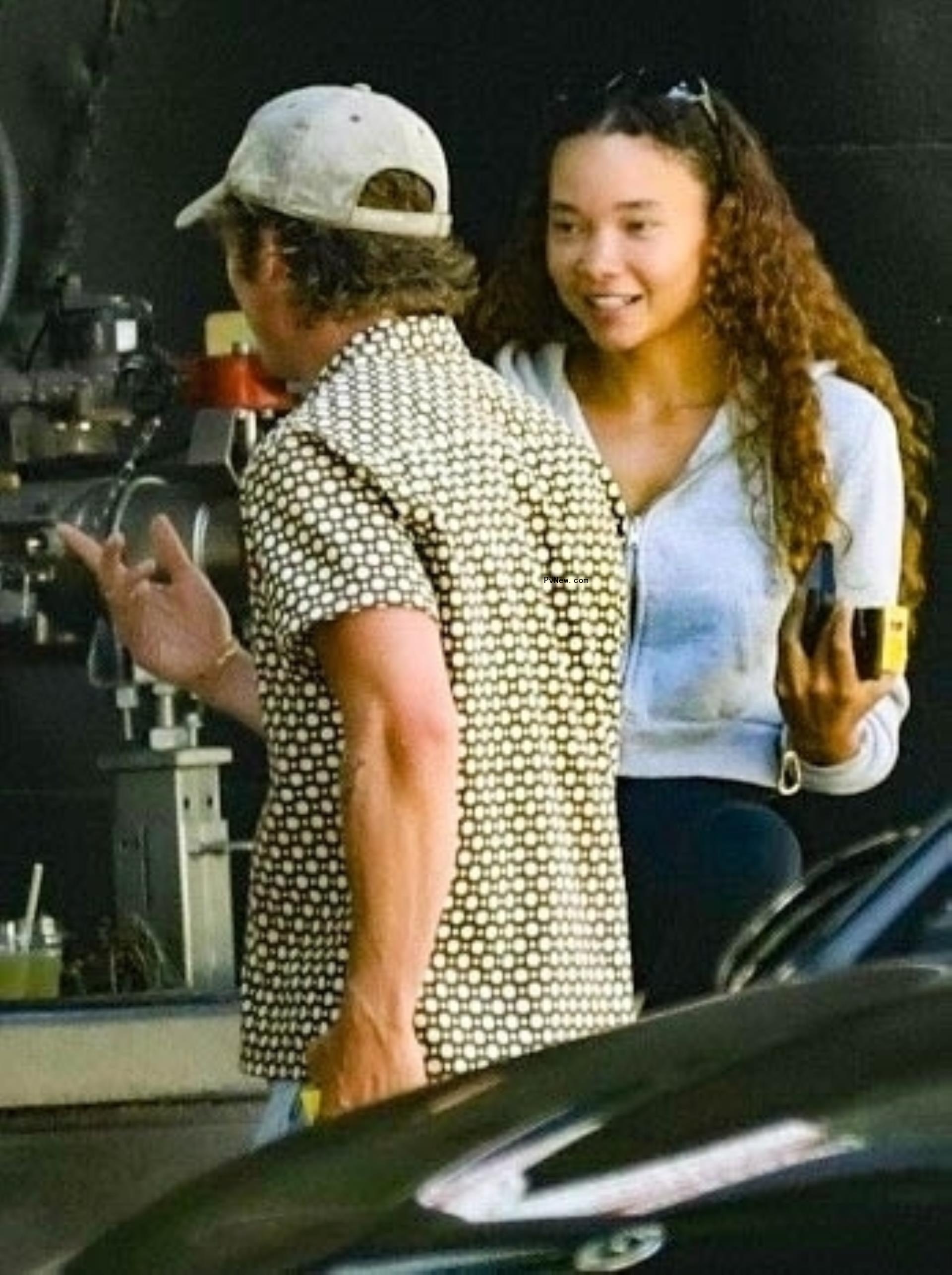 Jeremy Allen White chatting with Ashley Moore.