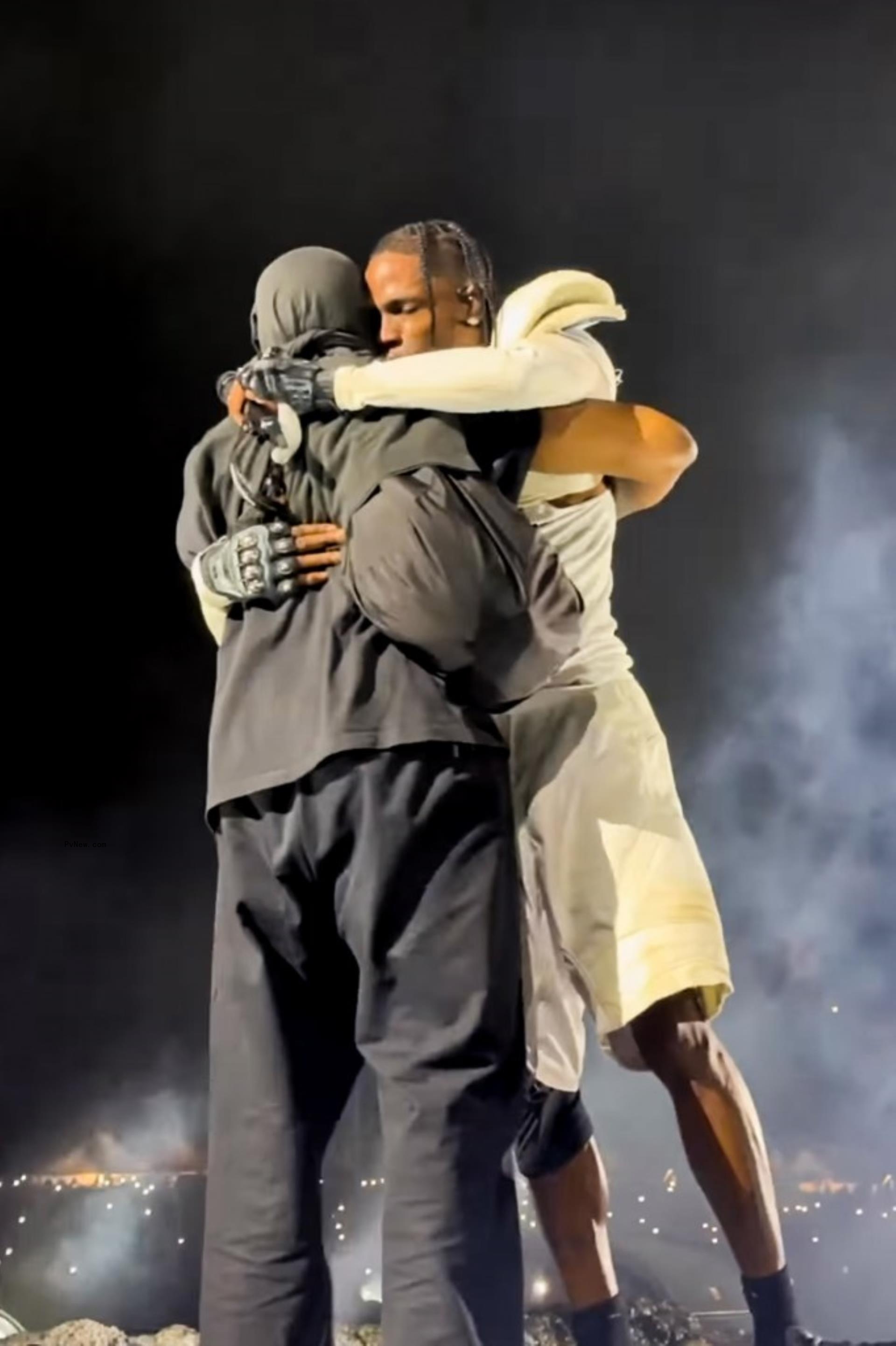Travis Scott and Kanye West hugging
