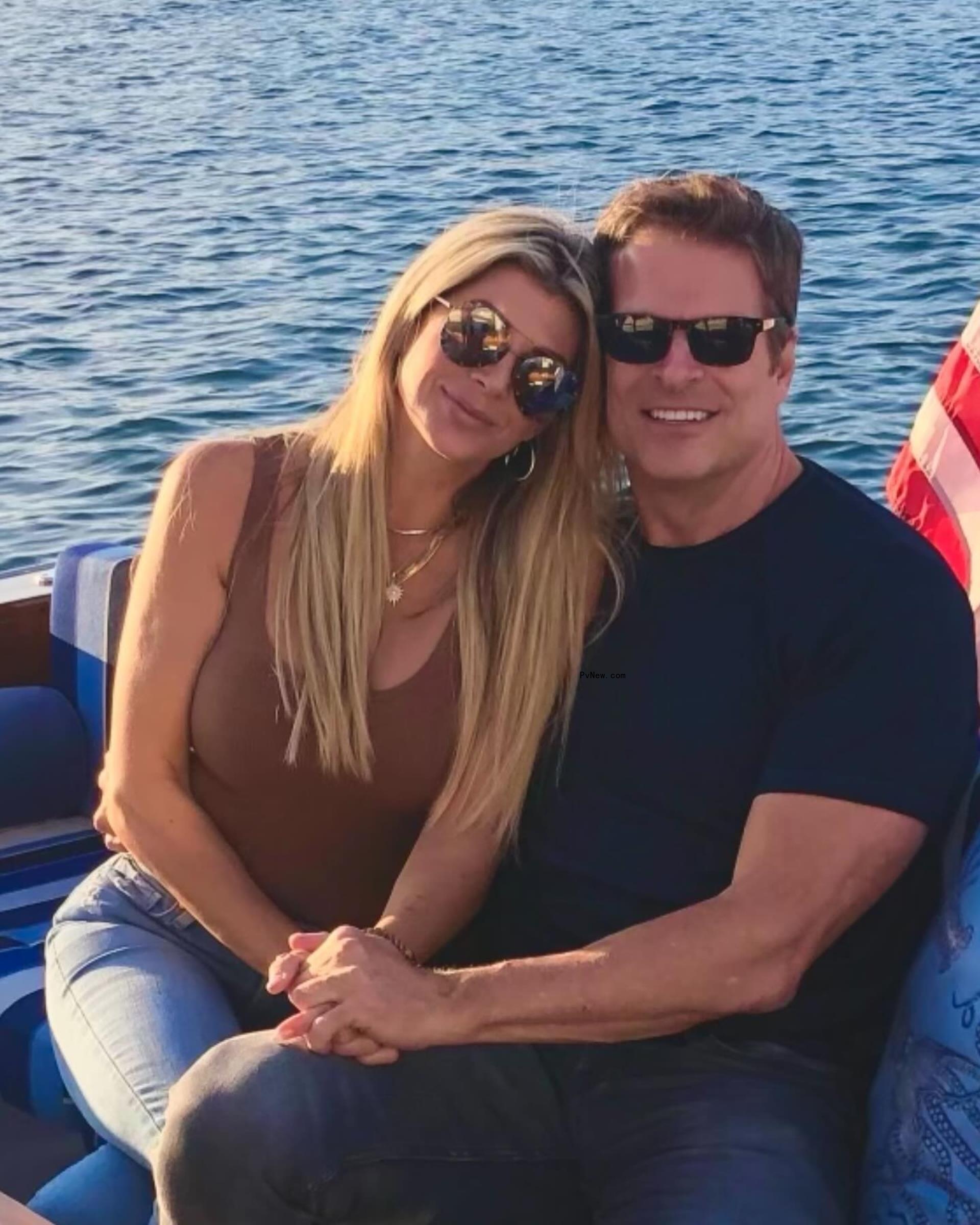 Alexis Bellino and John Janssen sitting together