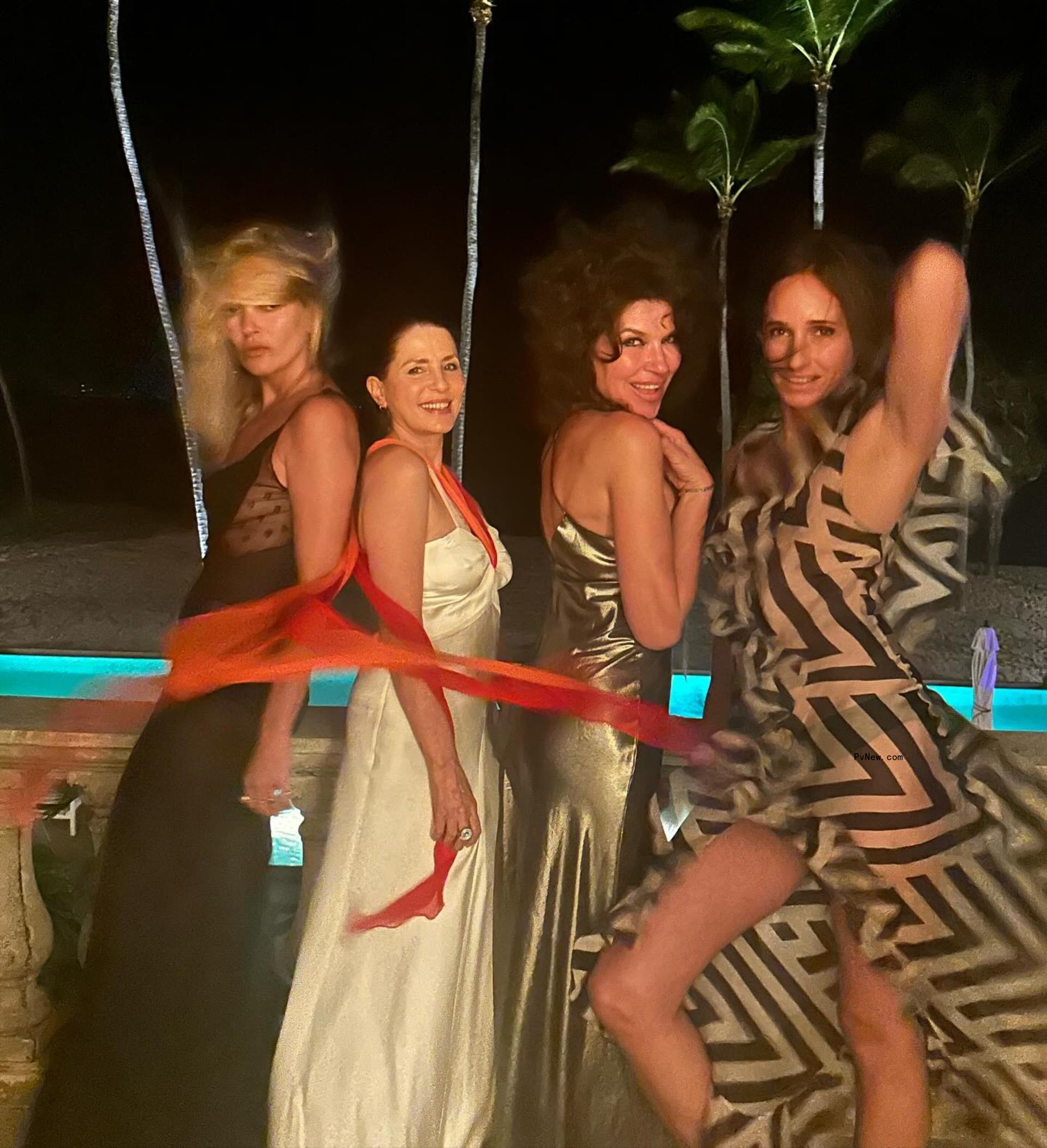 Kate Moss posing with friends on her 50th birthday trip.