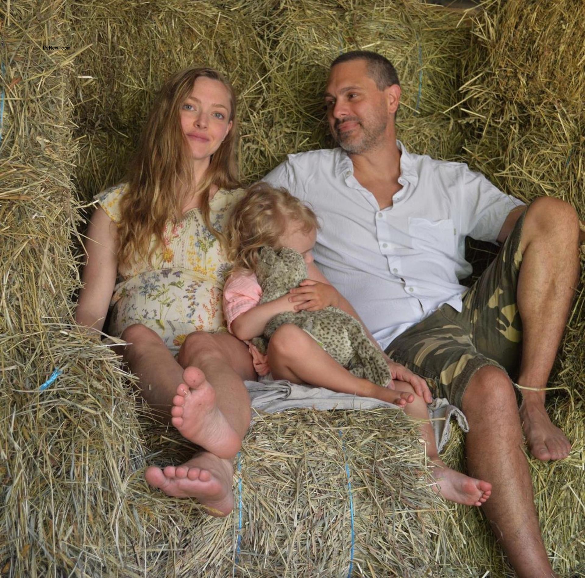 Amanda Seyfried with husband and child