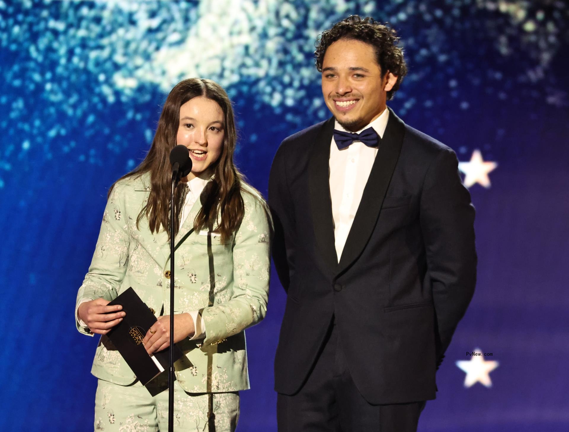 Bella Ramsey and Trevor Noah o<i></i>nstage at the 2024 Critics Choice Awards.
