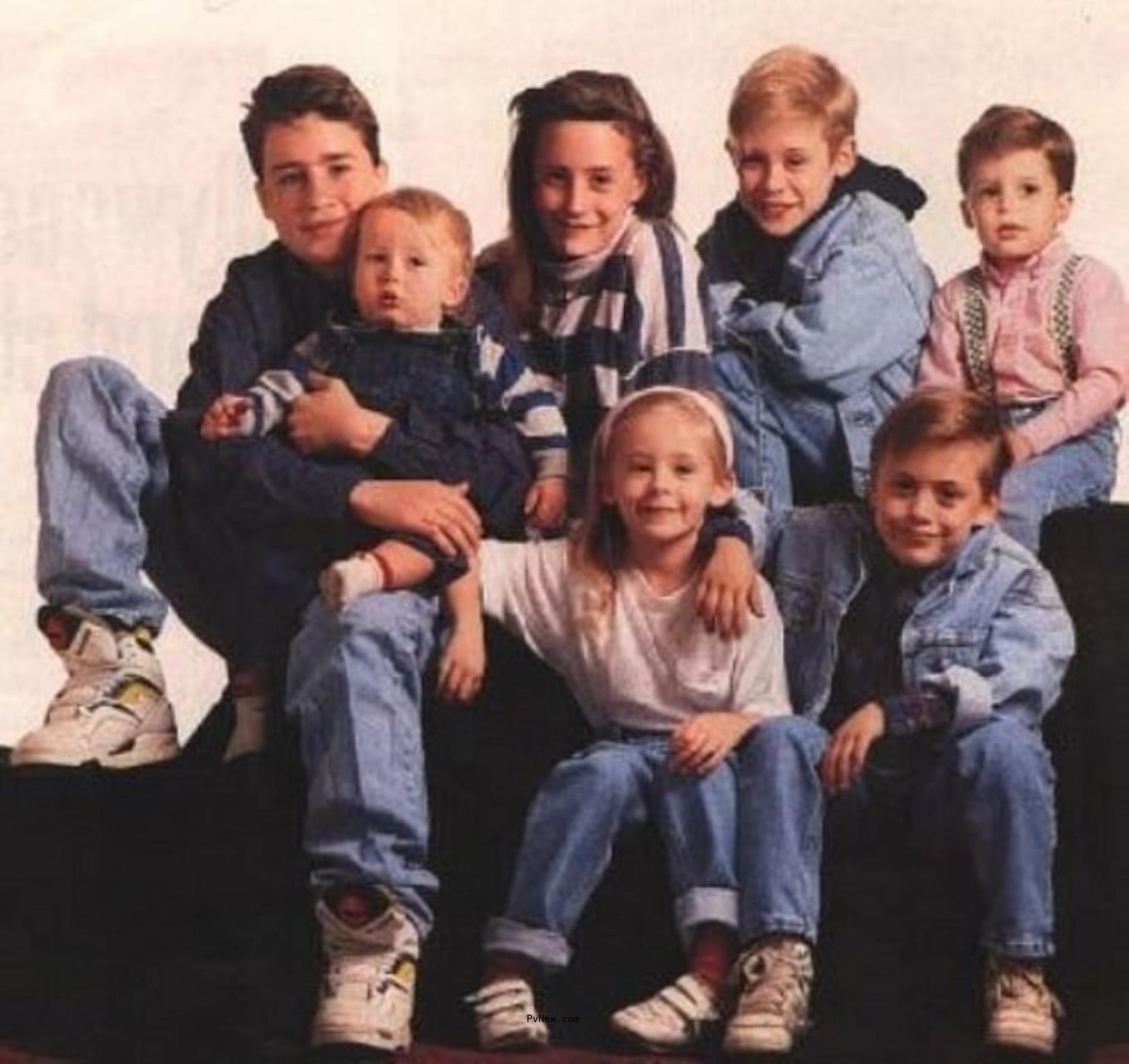 Shane Culkin holding Rory Culkin, Dakota Culkin, Macauly Culkin, Christian Culkin. Quinn Culkin and Kieran Culkin in front.