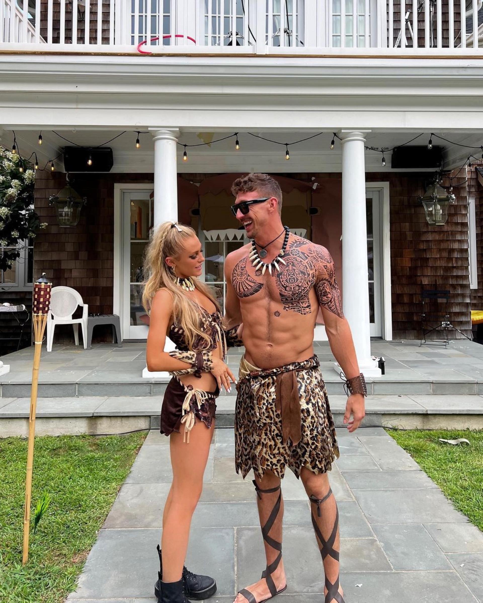 Sam Feher and Kory Keefer posing together 