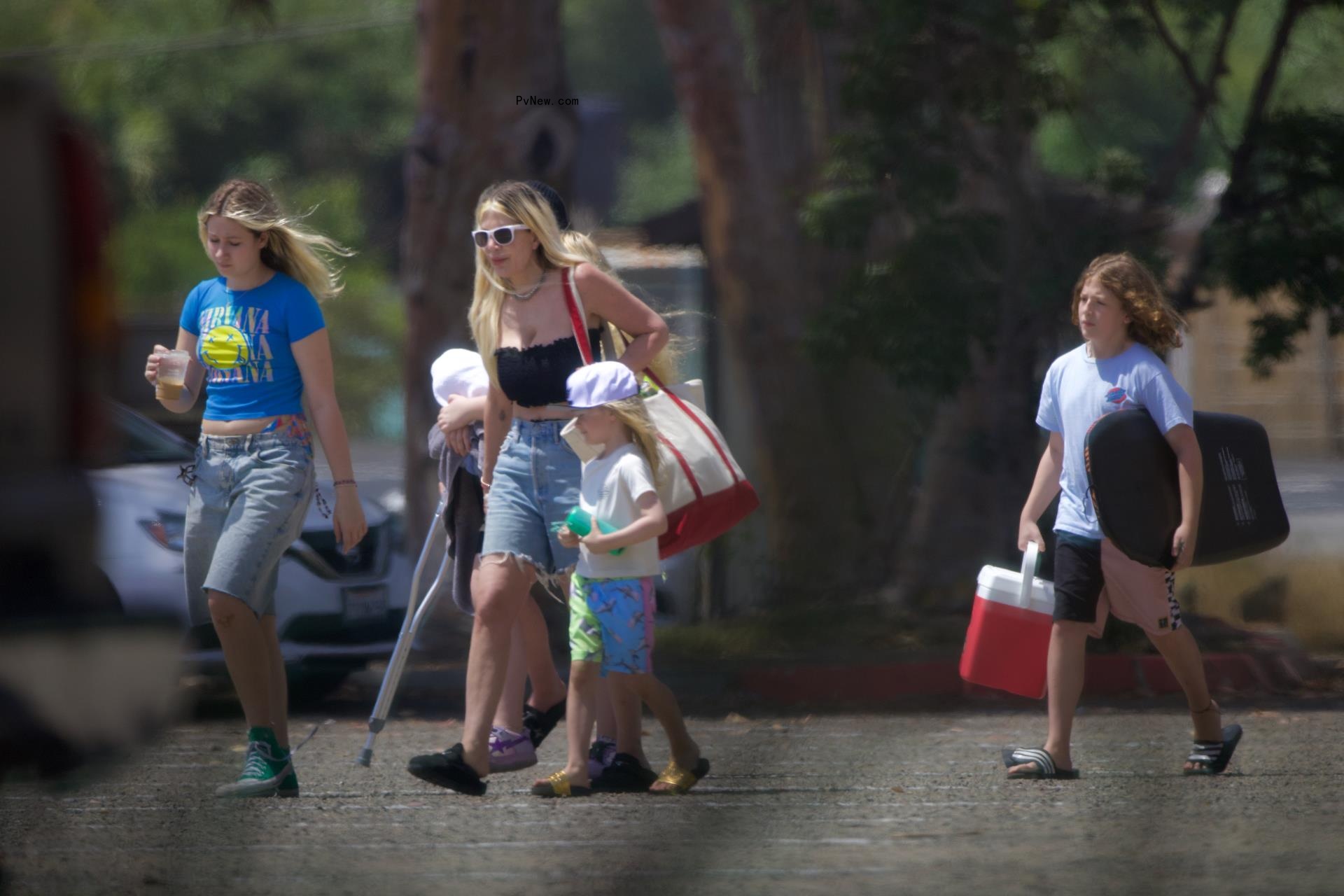 Tori Spelling and her kids at the beach