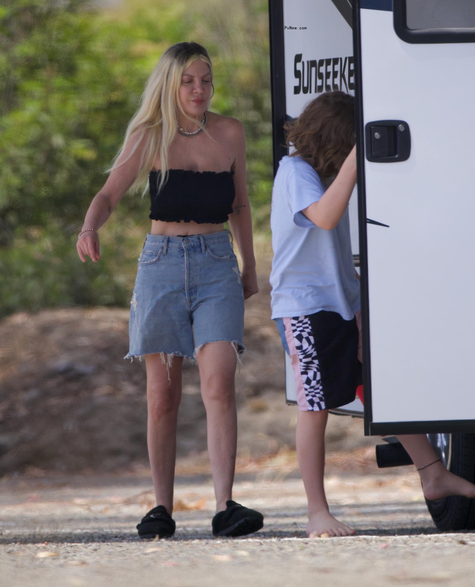 Tori Spelling and her kids at the beach