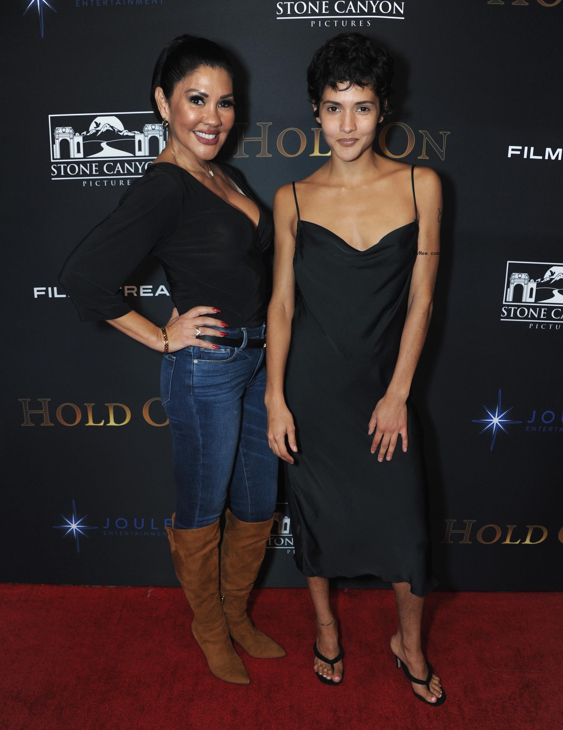 Mia St. John and daughter Paris at a red carpet event in 2019.