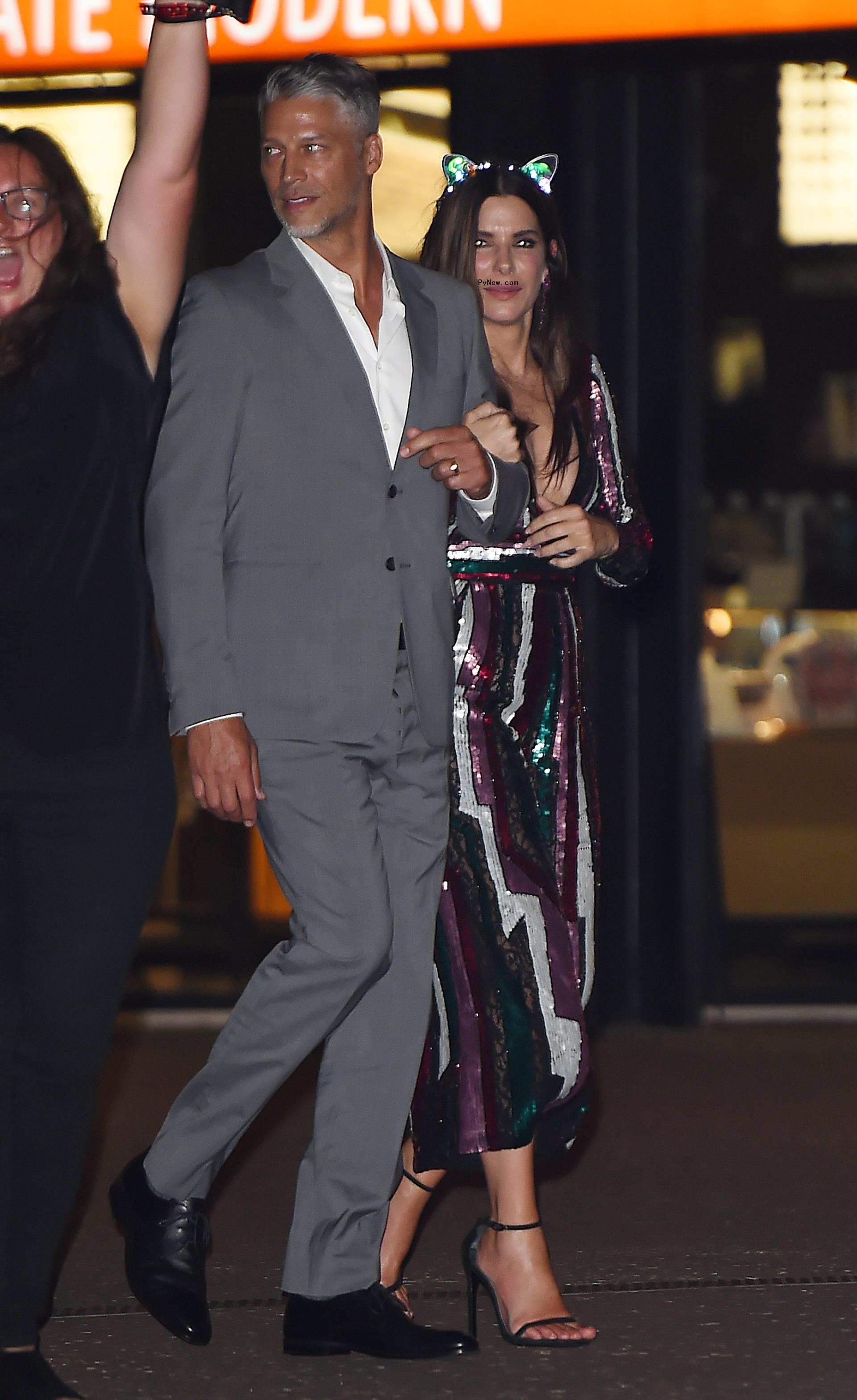 Sandra Bullock and Bryan Randall leaving the