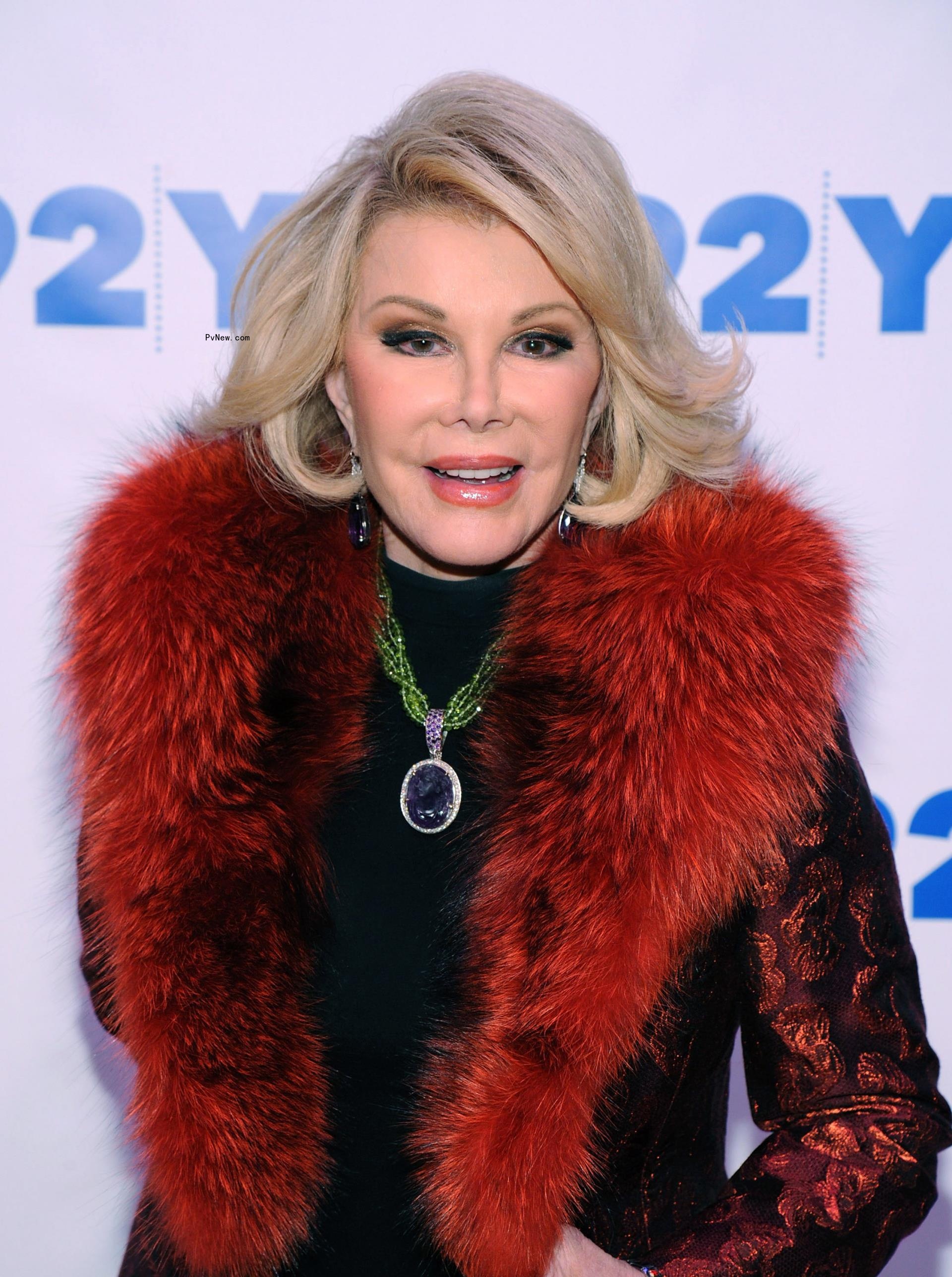 Joan Rivers in red fur