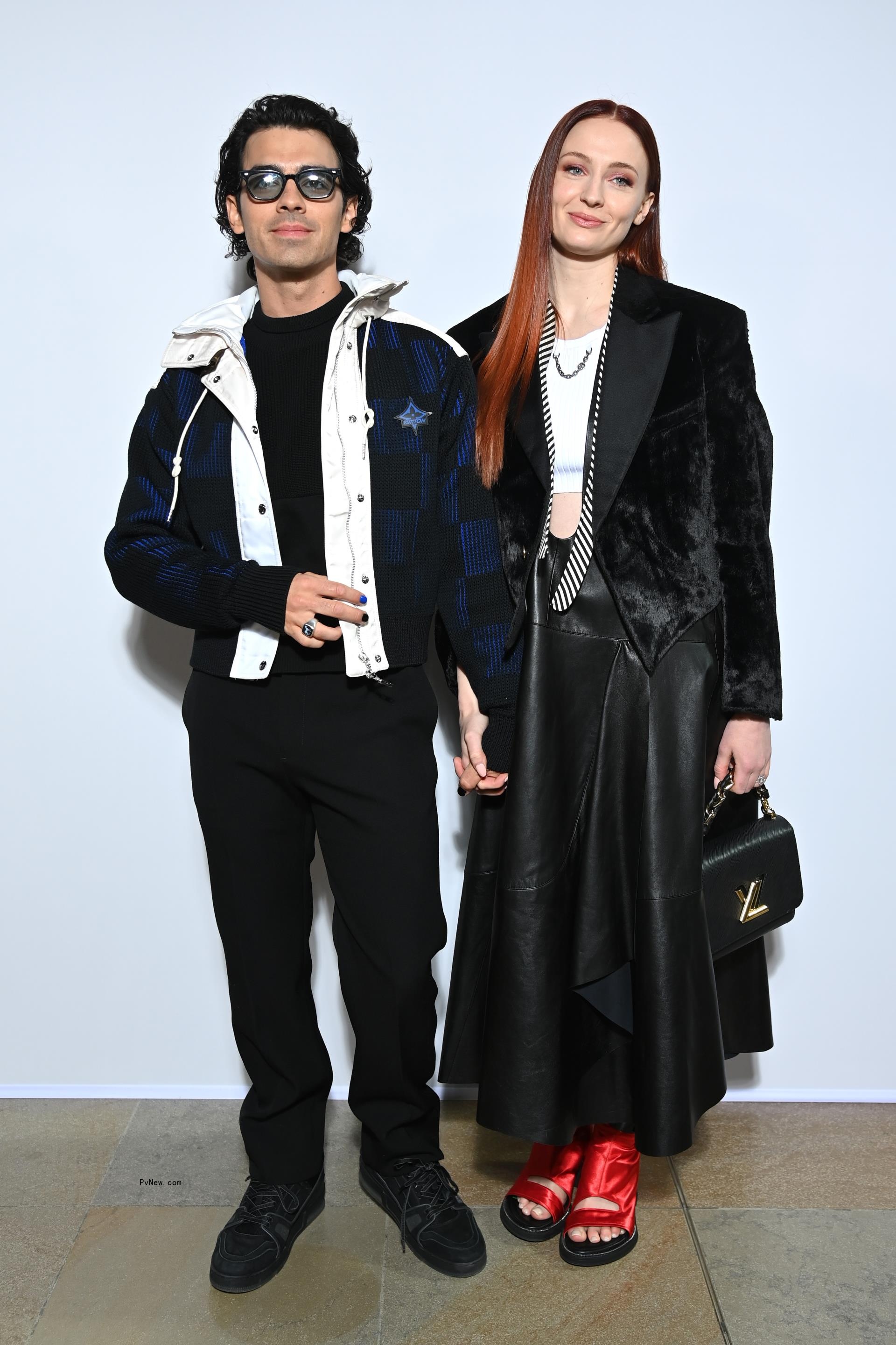 Joe Jo<i></i>nas and Sophie Turner attend the 2022 Louis Vuitton Womenswear Fall/Winter 2022/2023 show.