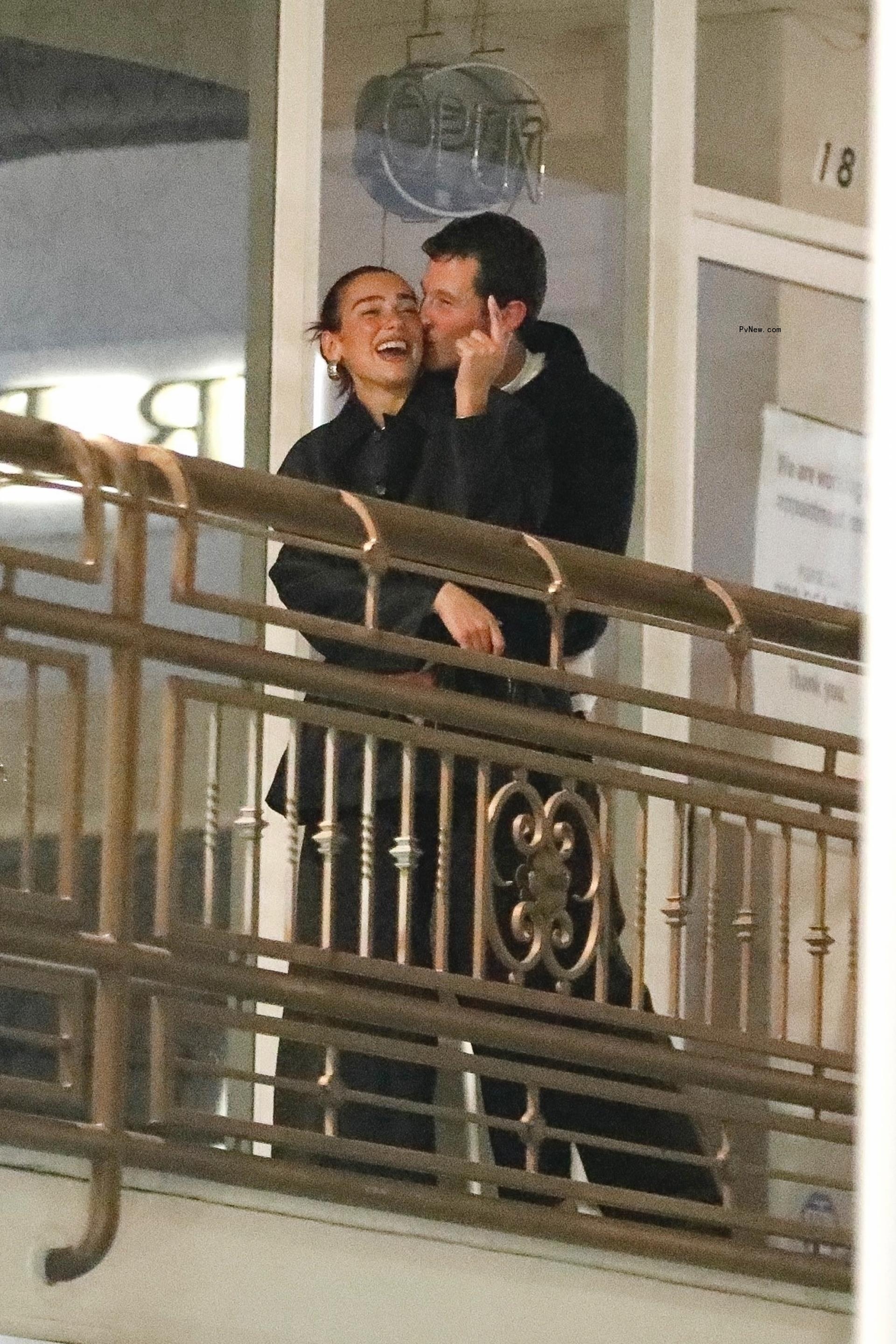 Dua Lipa kissing Callum Turner.