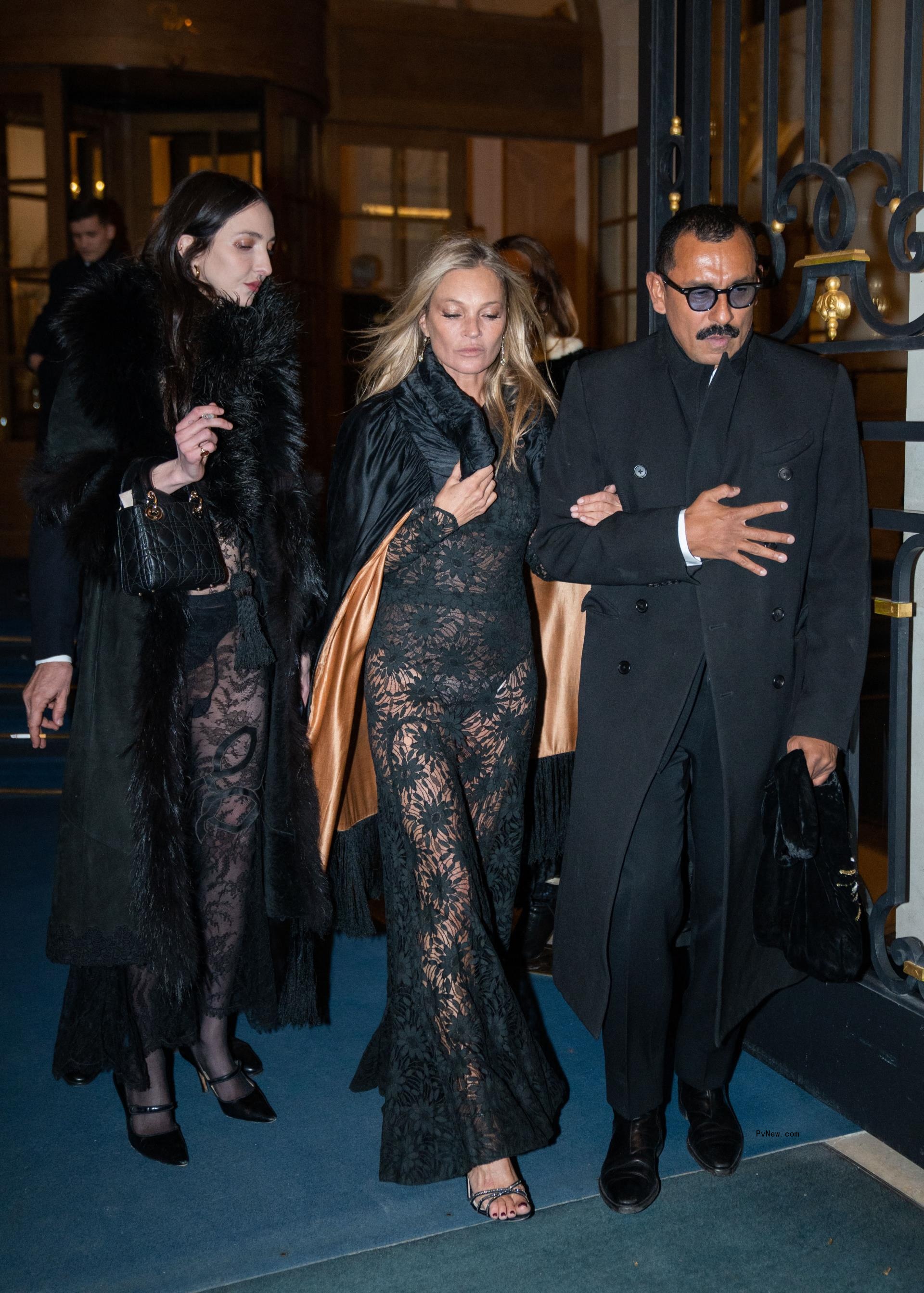 Kate Moss celebrates 50th birthday in sheer dress