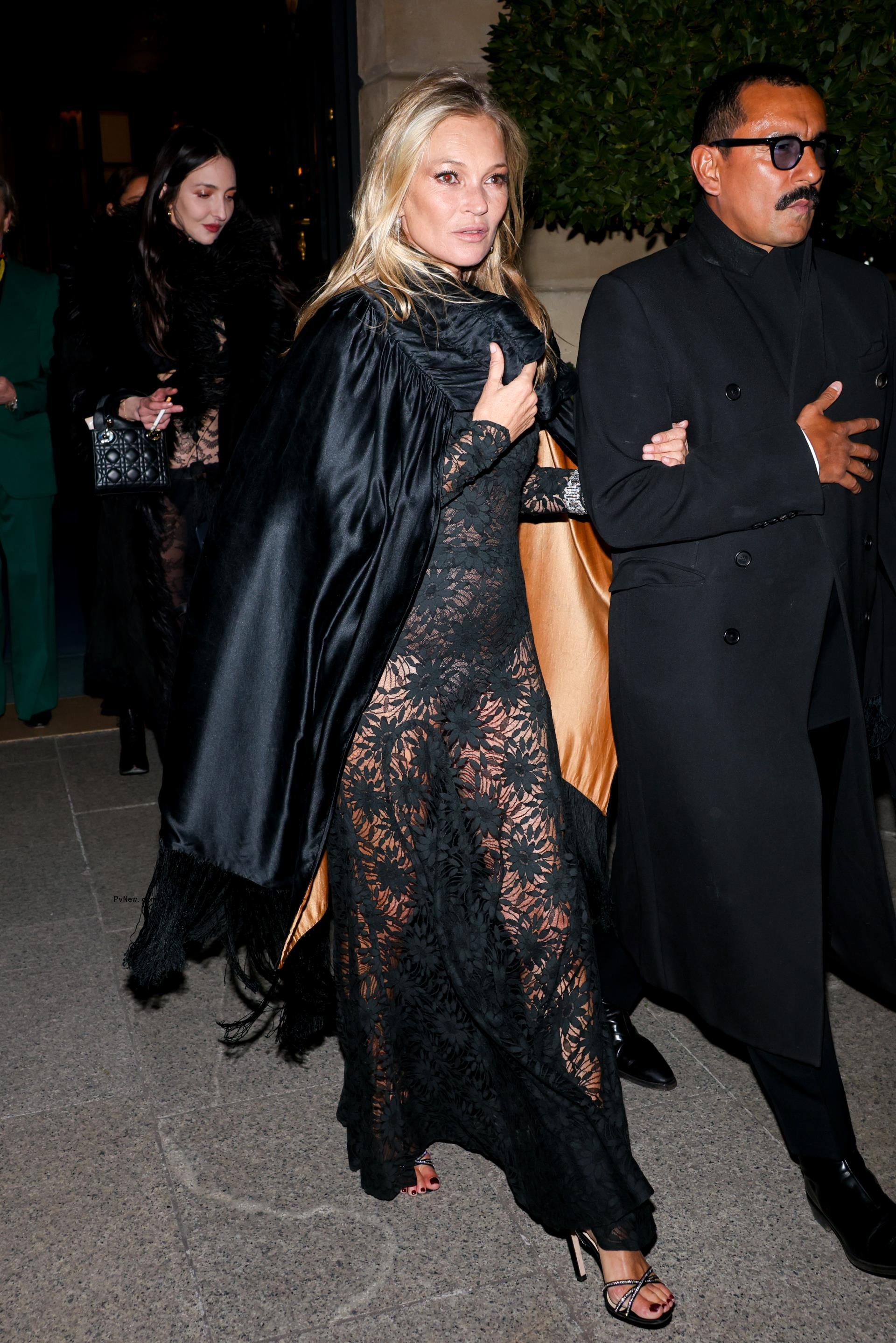 Kate Moss celebrates 50th birthday in sheer dress