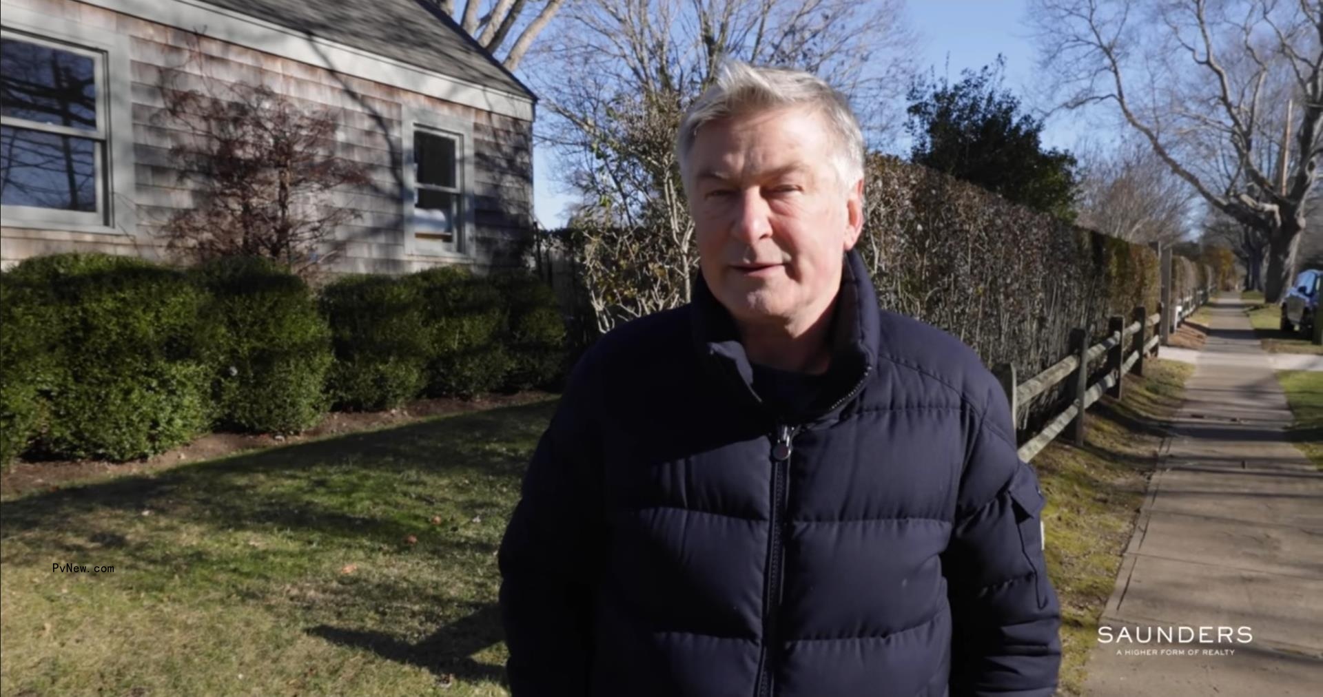 Alec Baldwin talking outside
