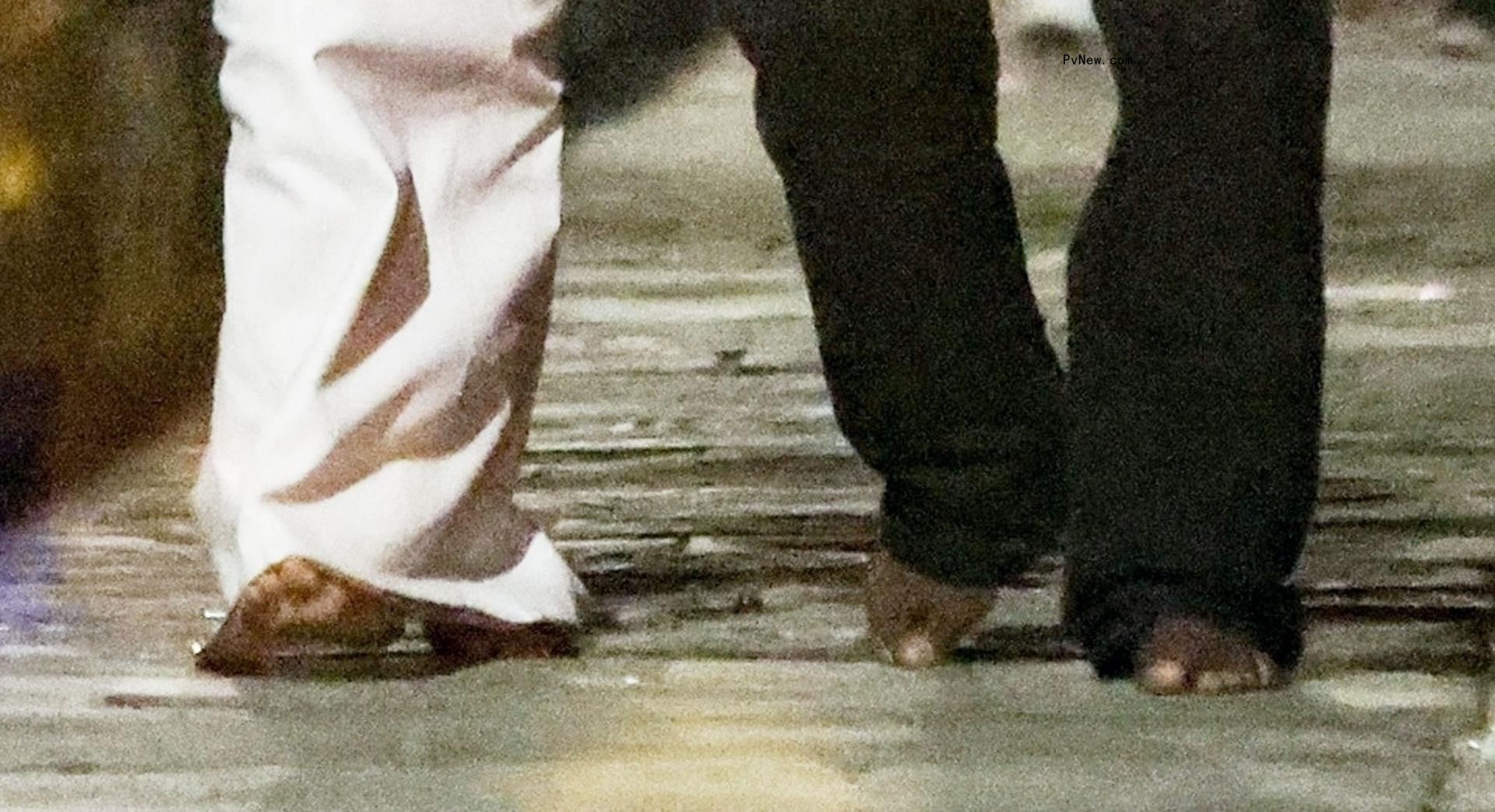 Kanye West and Bianca Censori's feet in Italy.