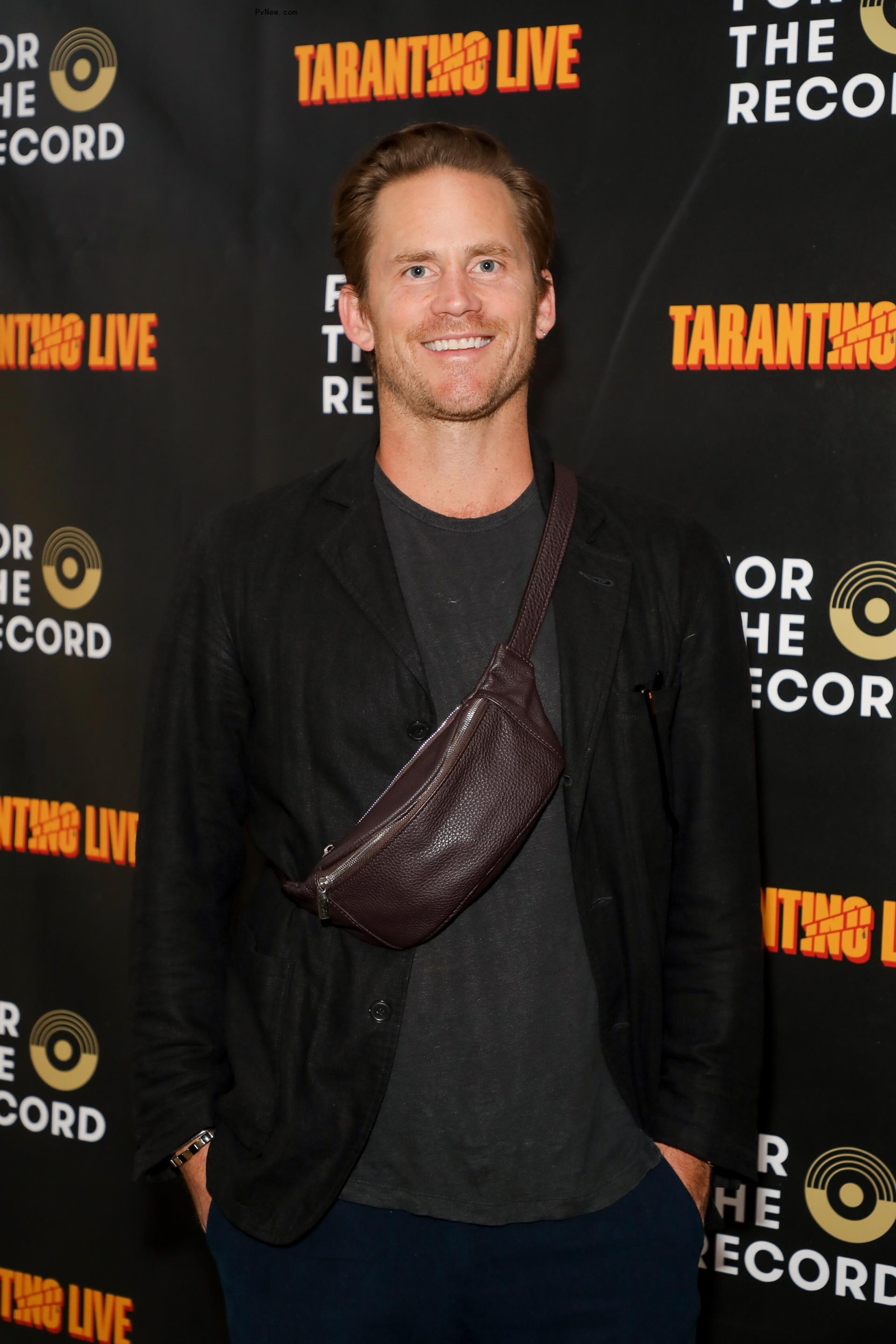 Grant Hughes at a red carpet premiere.