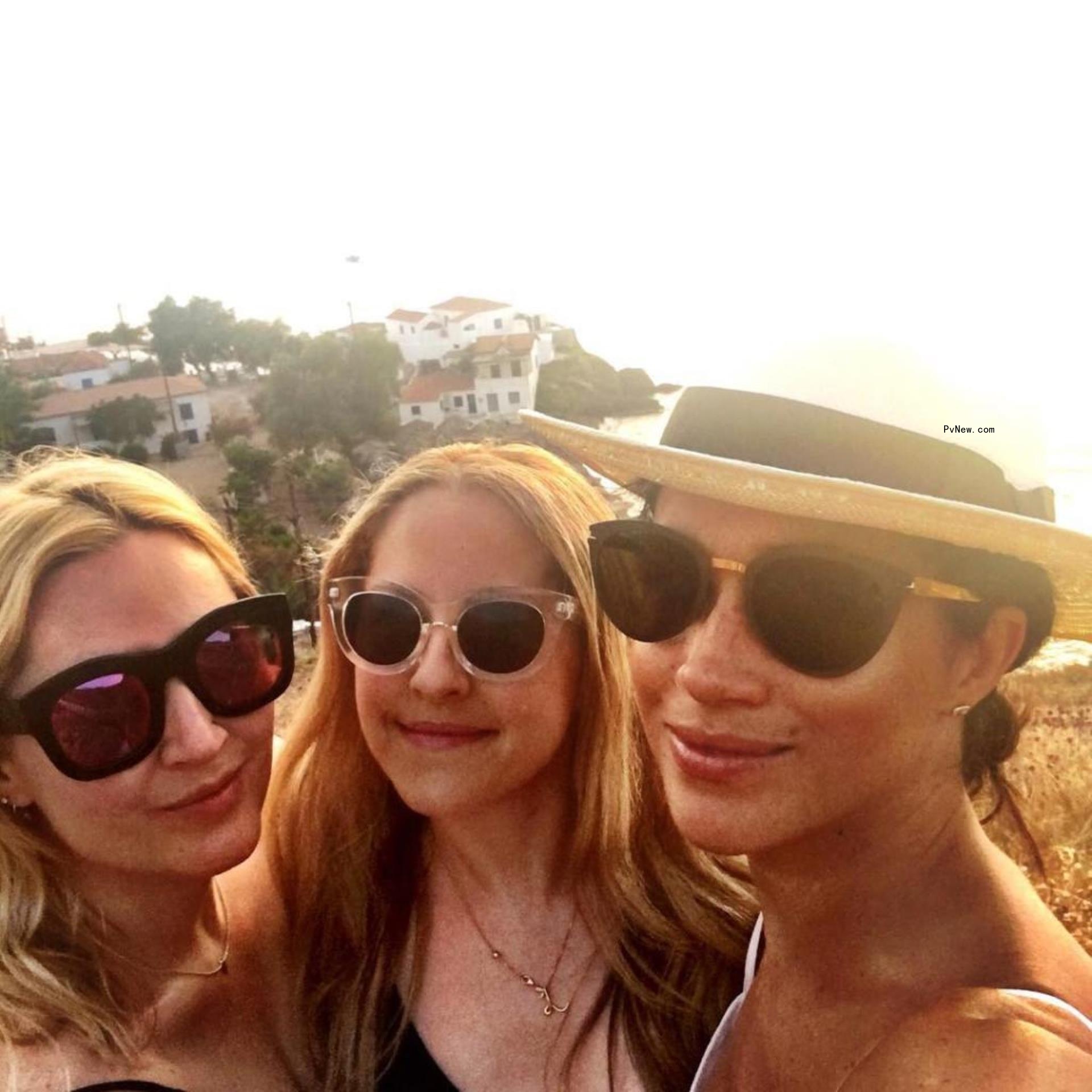 A selfie of Meghan Markle, Lucy Fraser and another friend.